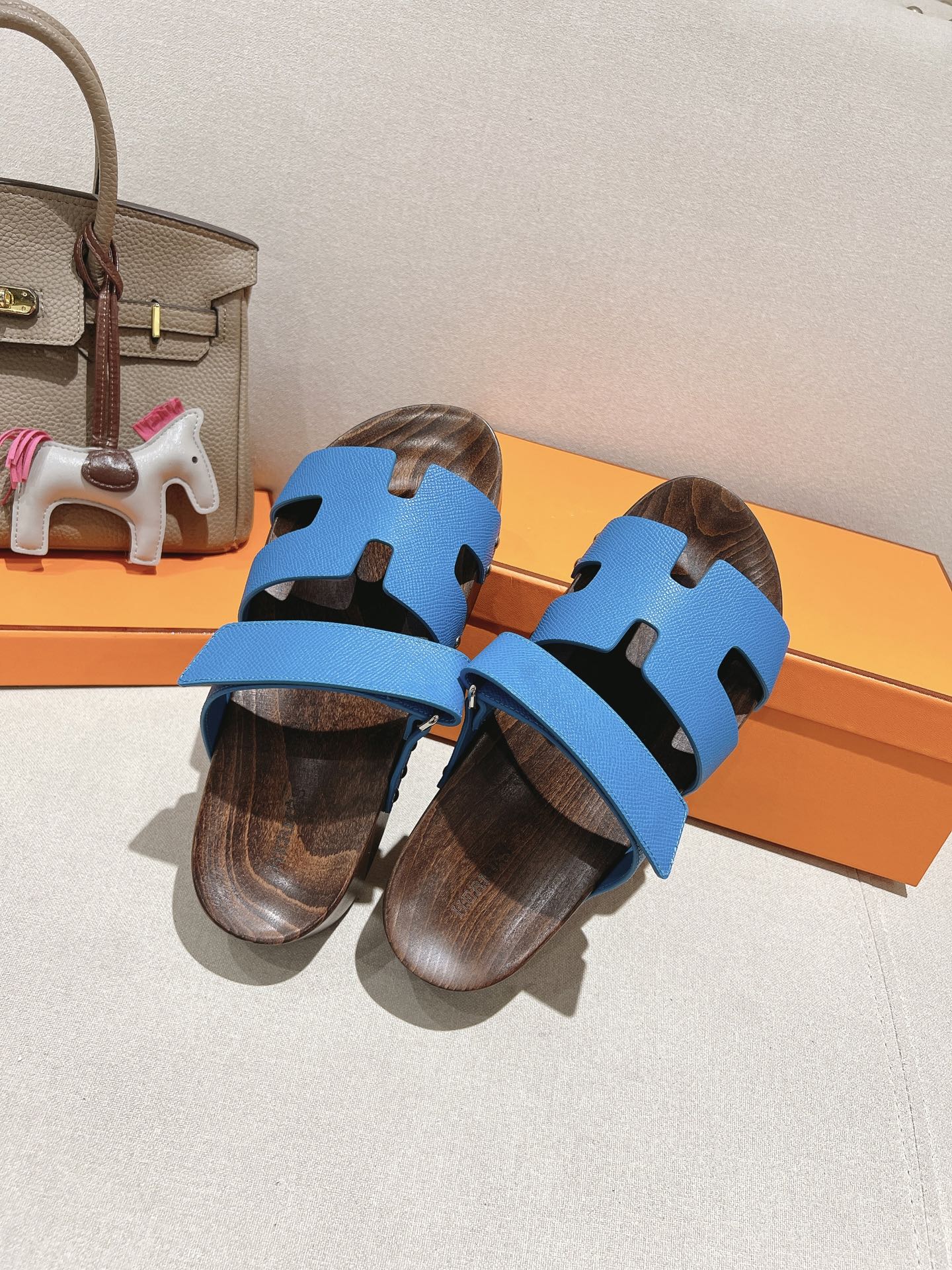 Blue Hermes Ankara leather slippers with brown patterned sole