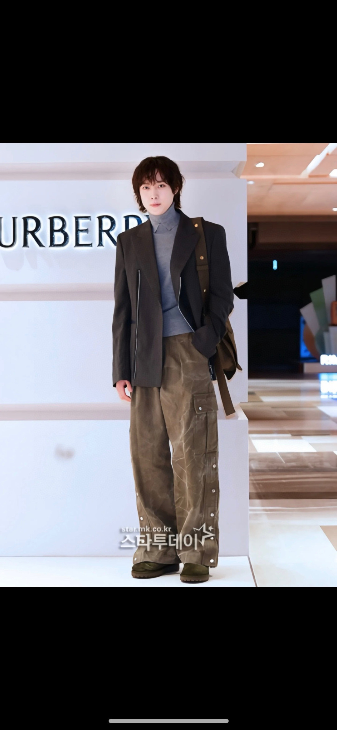 Burberry Canvas and leather-trimmed messenger bag