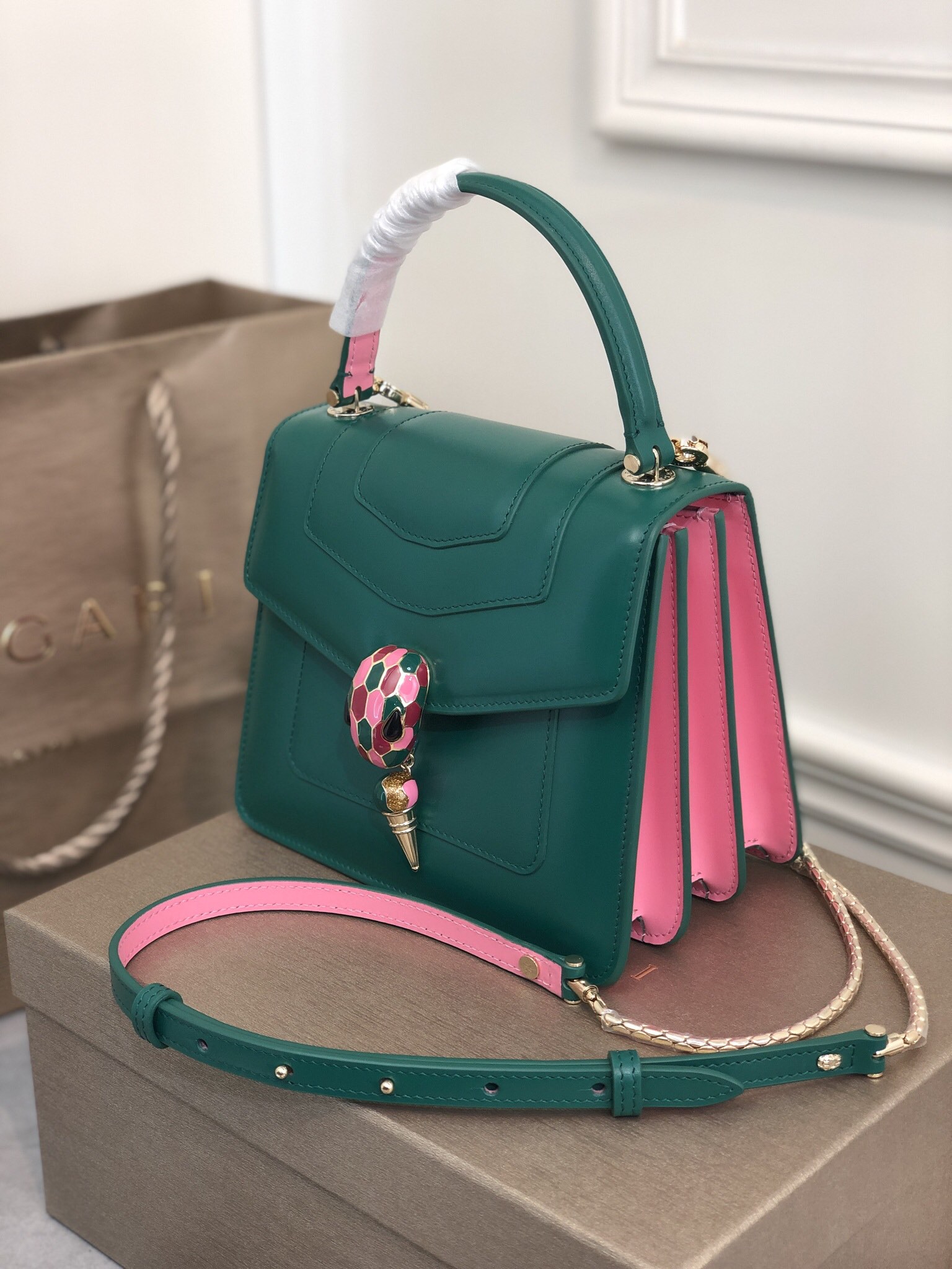 Bvlgari green/pink logo Patent And Leather Isabella Rossellini Top Handle Bag Bvlgari | TLC