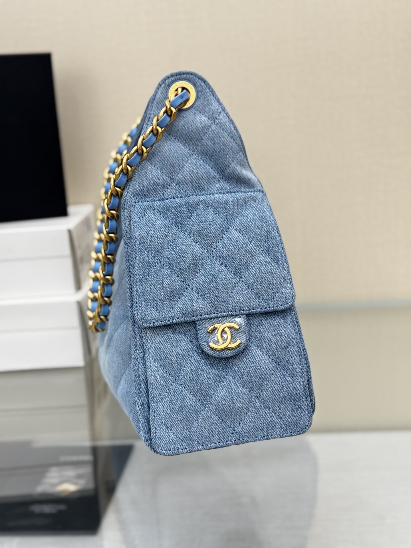 Chanel 25 medium handbag, Washed denim & gold-tone