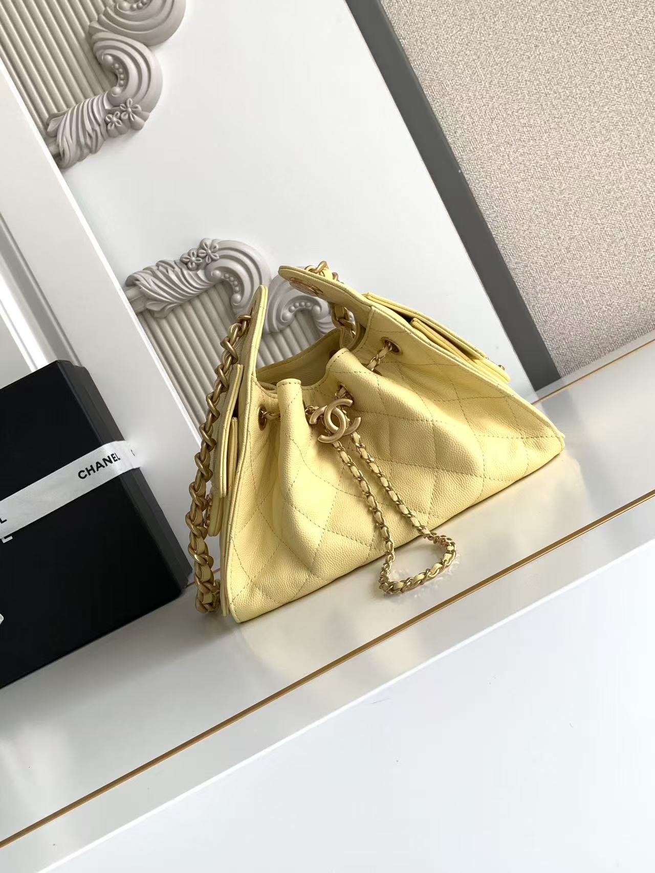 Chanel 25 small handbag, Grained calfskin & gold-tone metal, light yellow