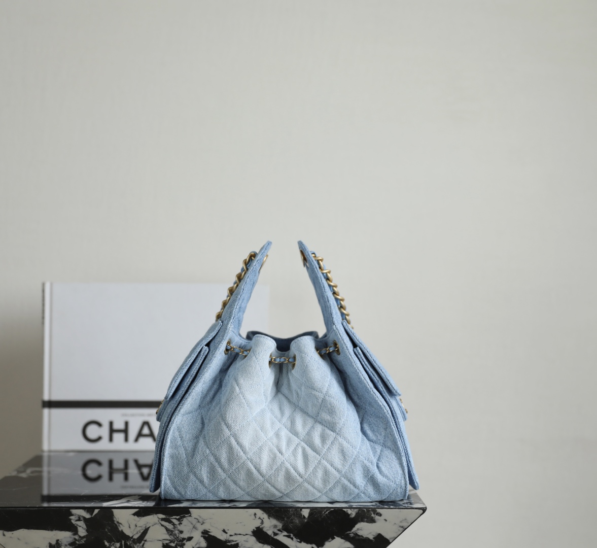 Chanel Chanel 25 small handbag, Washed denim & gold-tone