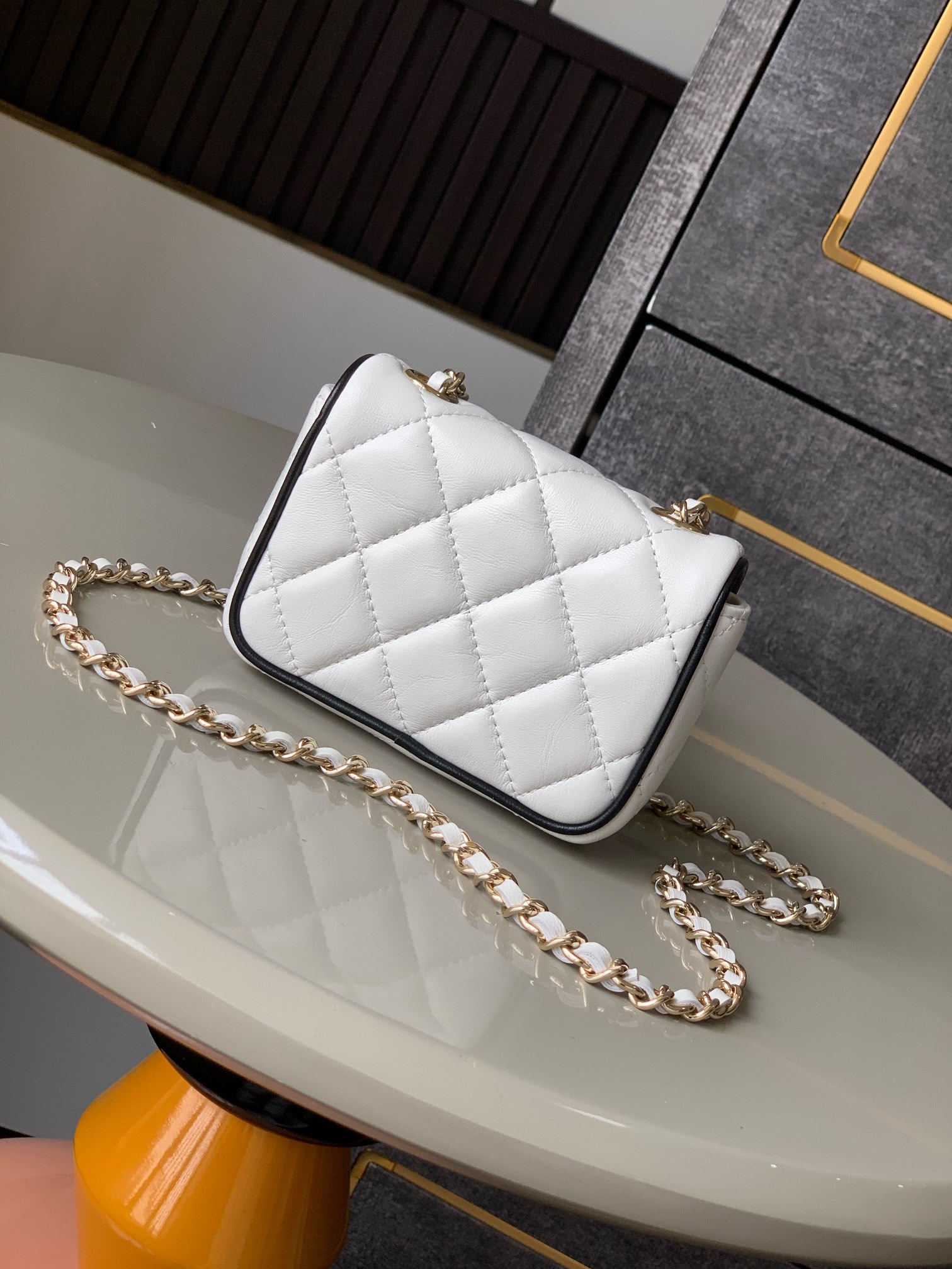 Chanel Clutch with chain - Lambskin & gold-tone metal, black & white