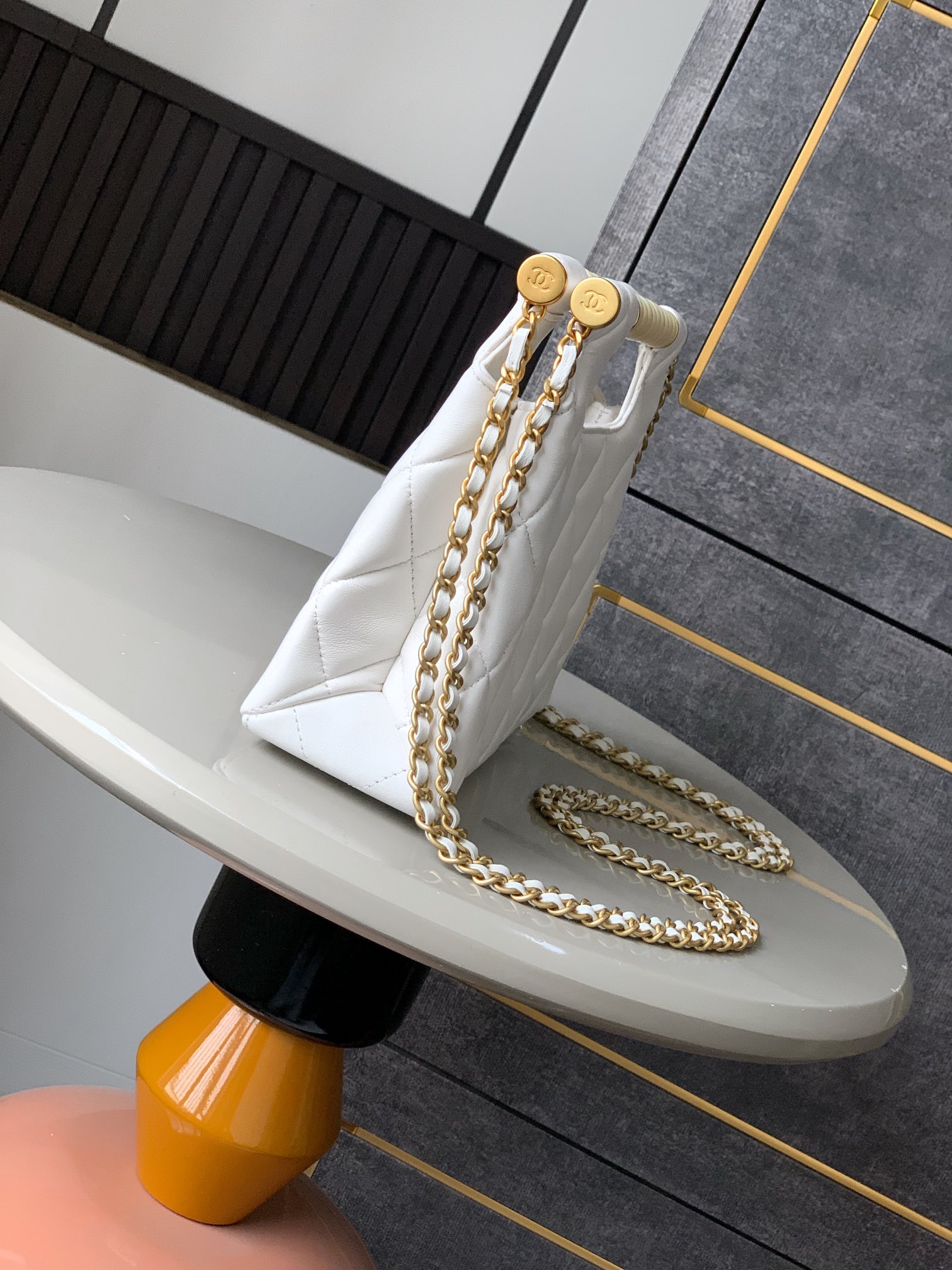 Chanel Flap bag with top handle, Shiny lambskin & gold-tone metal,