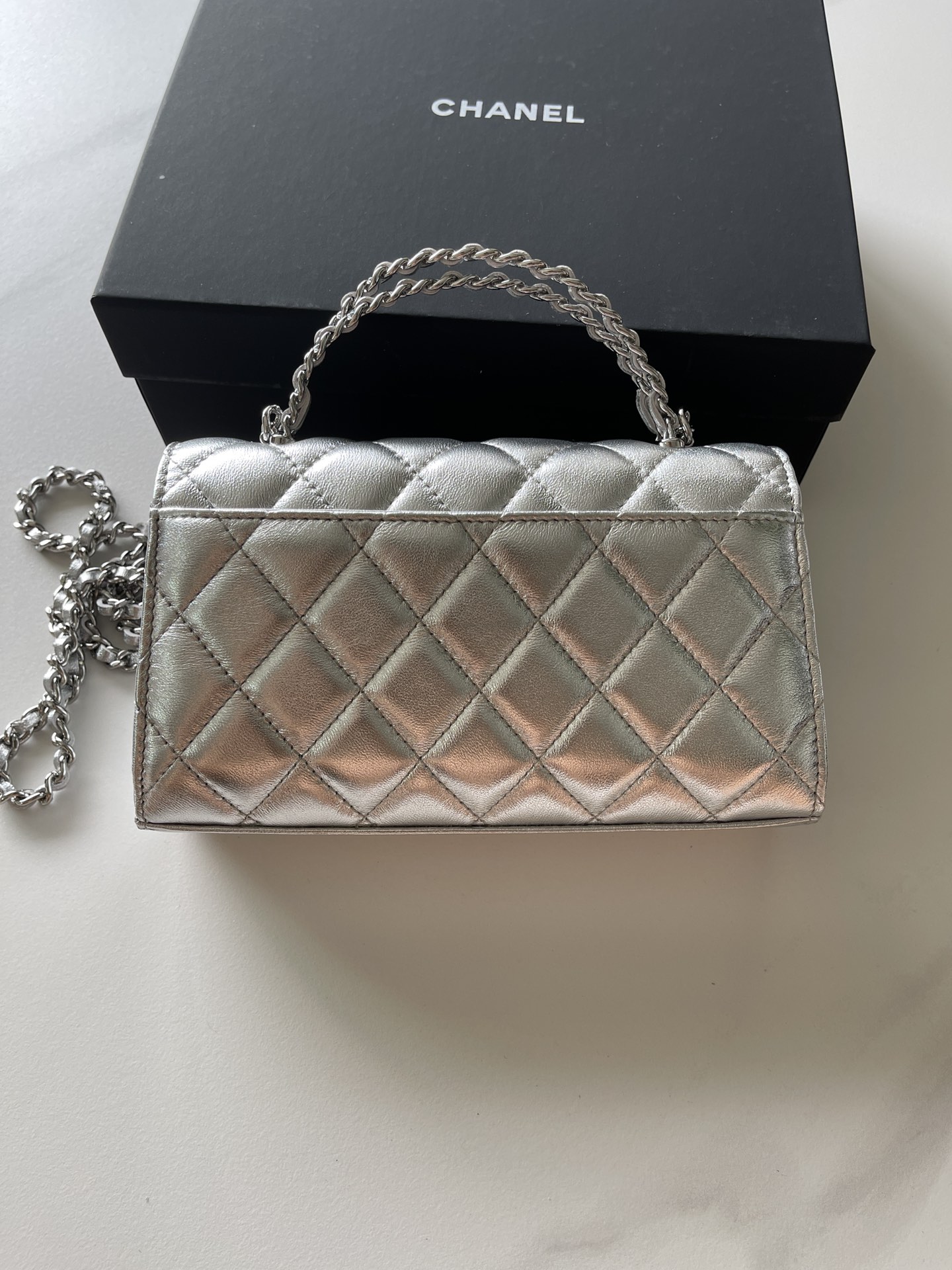 Chanel  Lambskin Quilted Chain Top Handle Phone Holder With Chain Silver