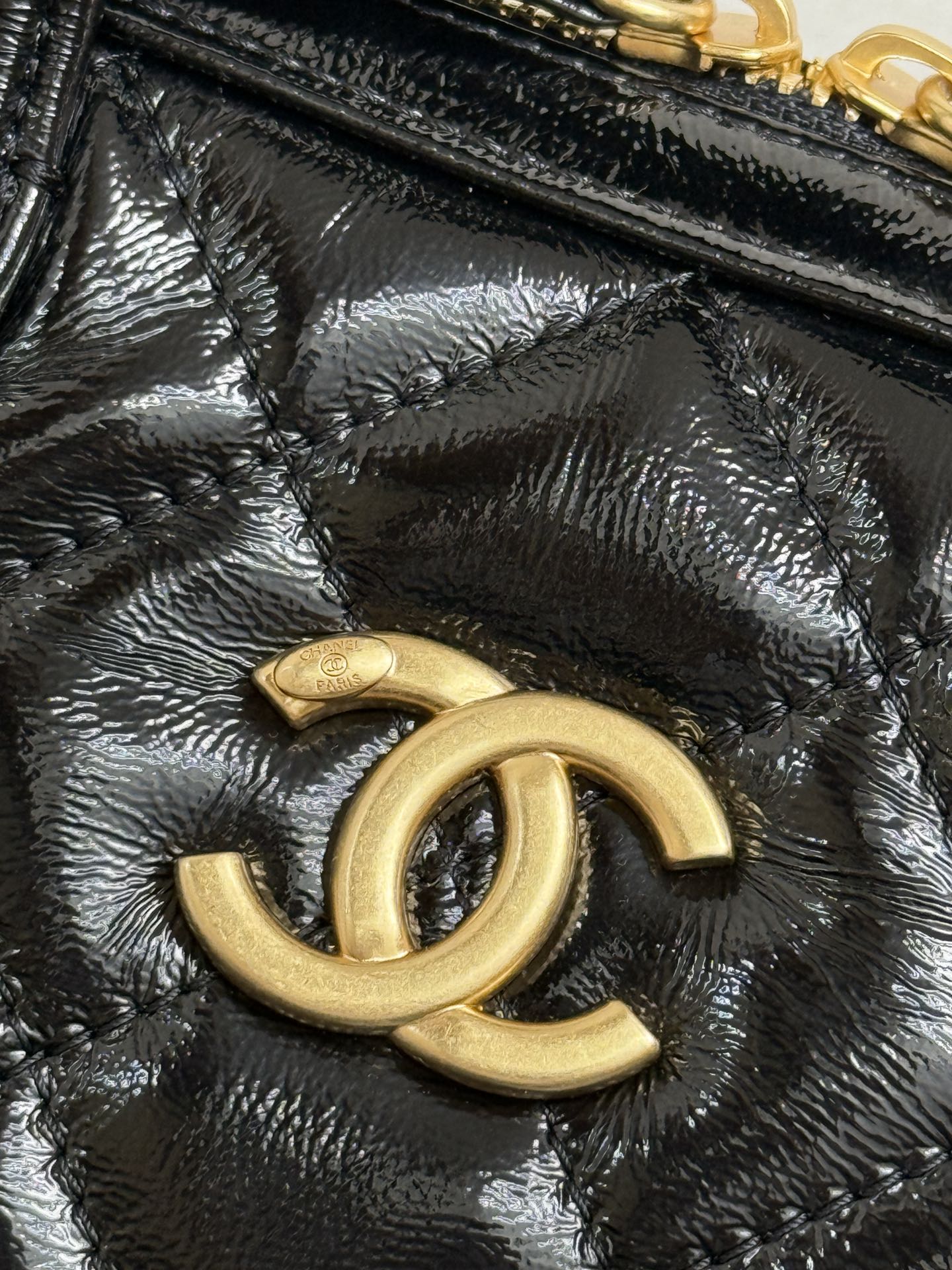 Chanel Large bowling bag, Patent crumpled calfskin & gold-tone
