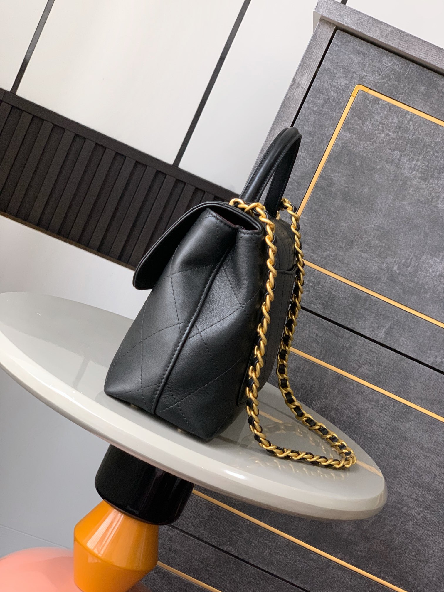 Chanel  Large Flap Bag with Top Handle   Calfskin & Gold-Tone Metal  Black