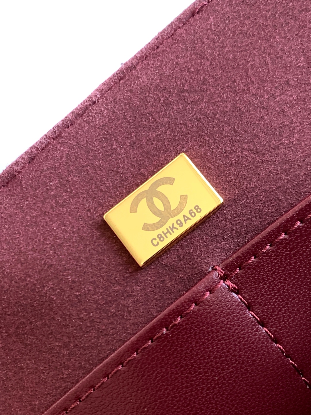 Chanel Maxi flap bag with top handle, Calfskin & gold-tone metal,black