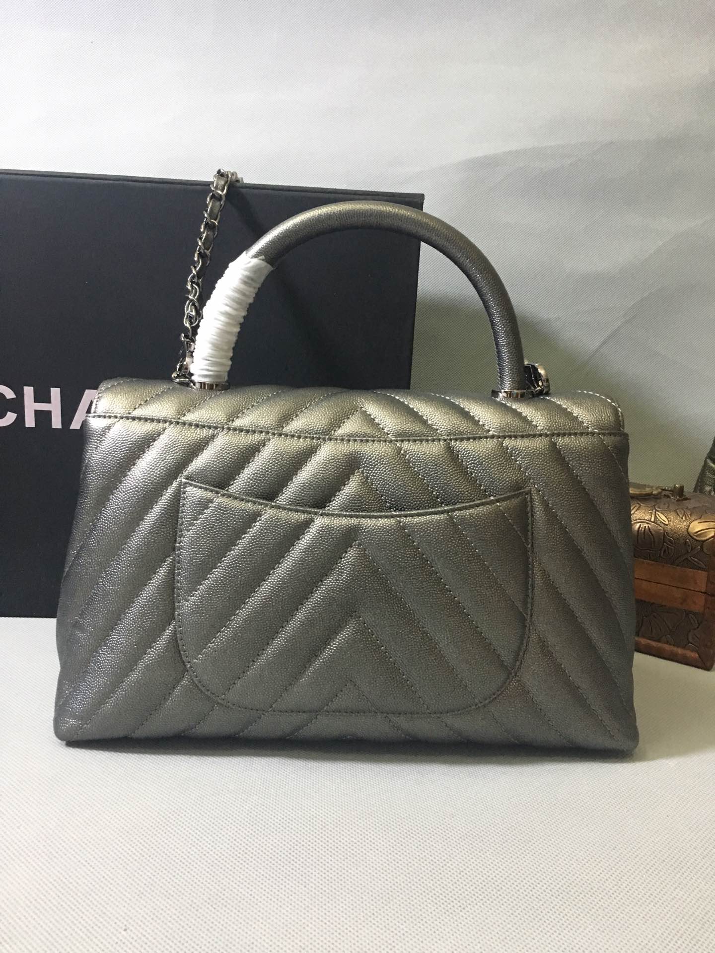 CHANEL Metallic Caviar Chevron Quilted Mini Coco