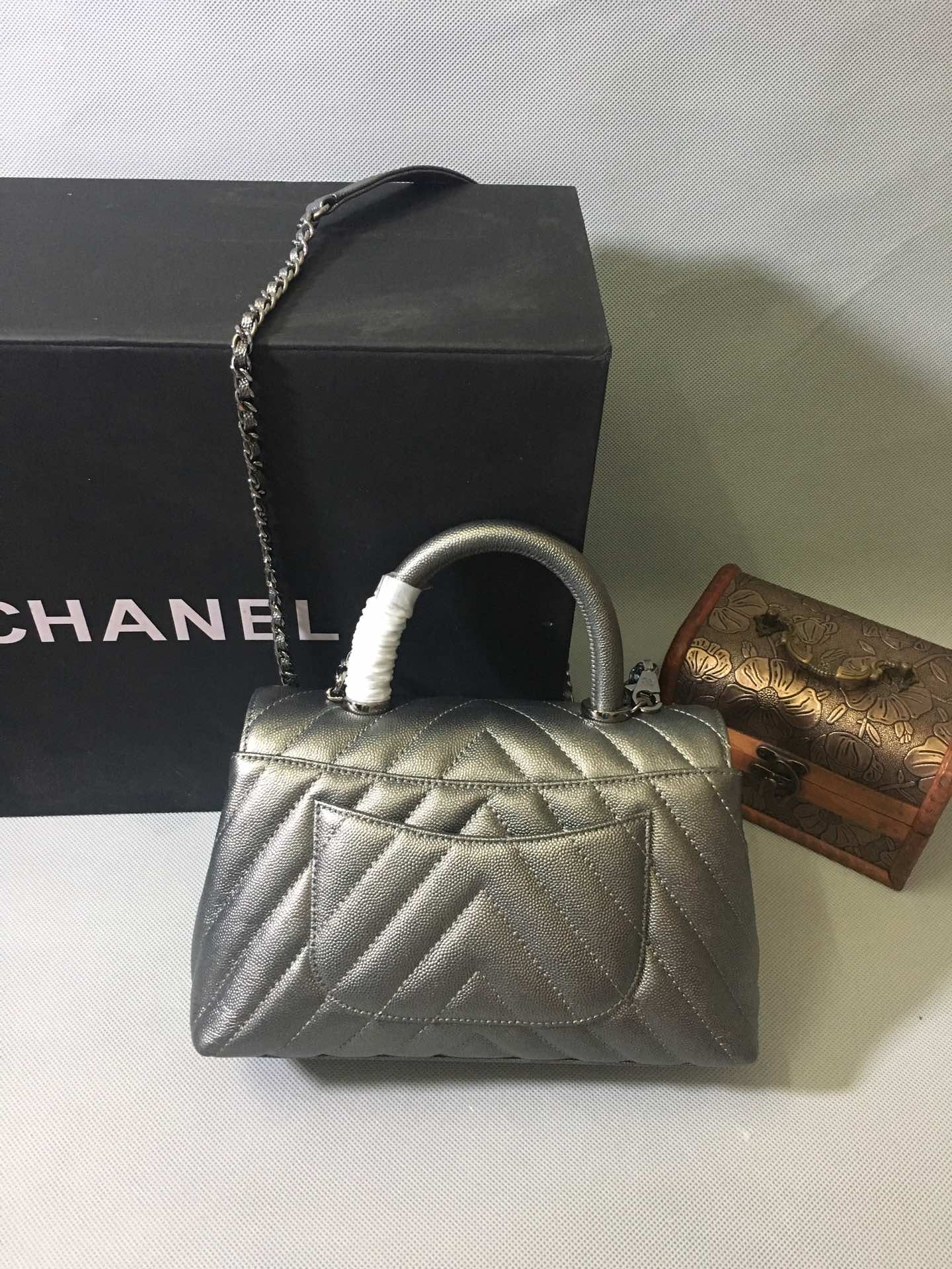 CHANEL Metallic Caviar Chevron Quilted Small Coco