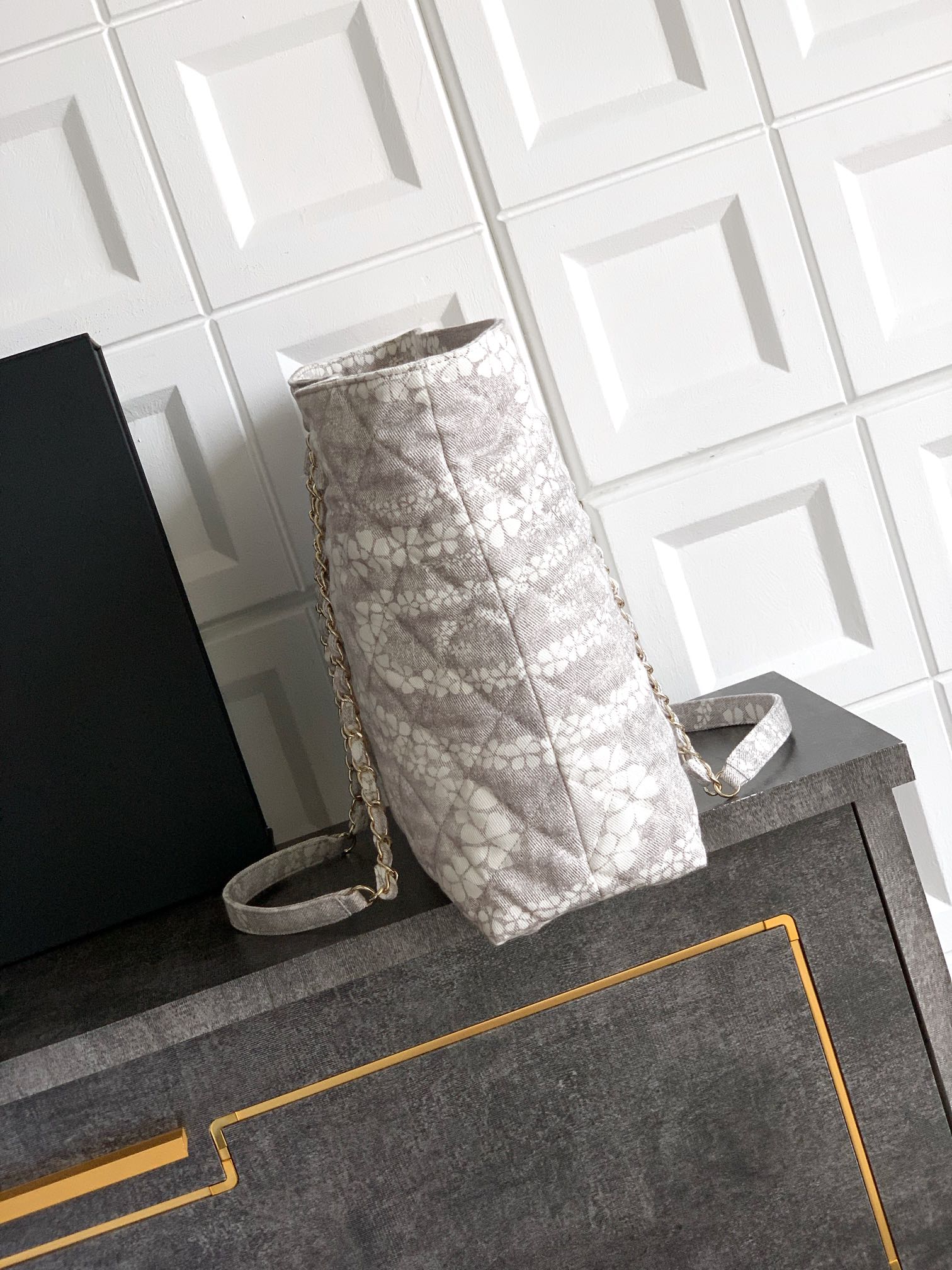 Chanel Shopping bag, Printed denim & gold-tone metal, gray & white