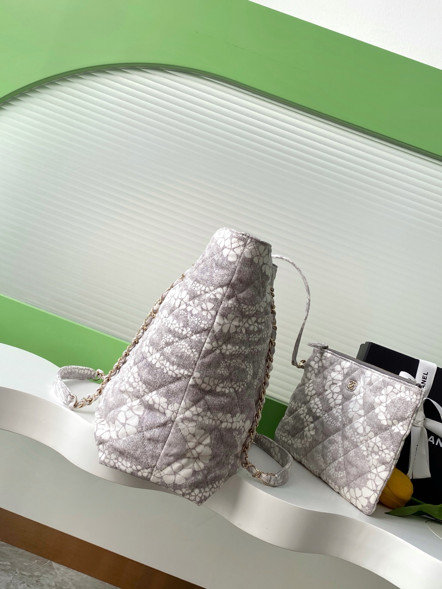 Chanel Shopping bag, Printed denim & gold-tone metal, gray & white