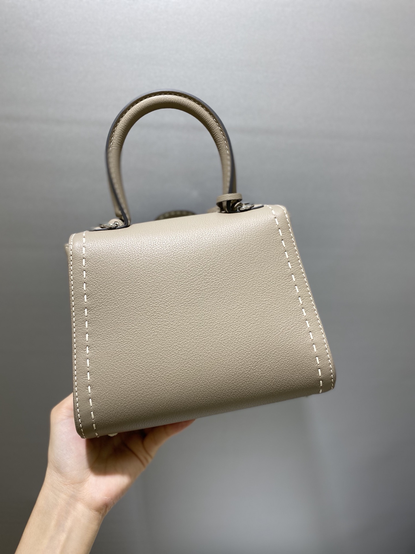 DELVAUX Grained Rodeo Calfskin Surpique Mini Brillant