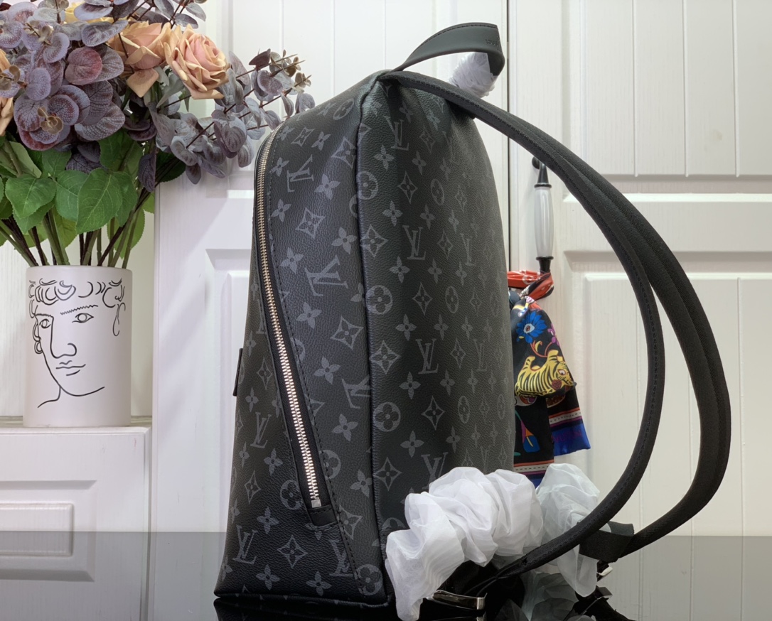 Discovery Slim Backpack Monogram Eclipse Canvas