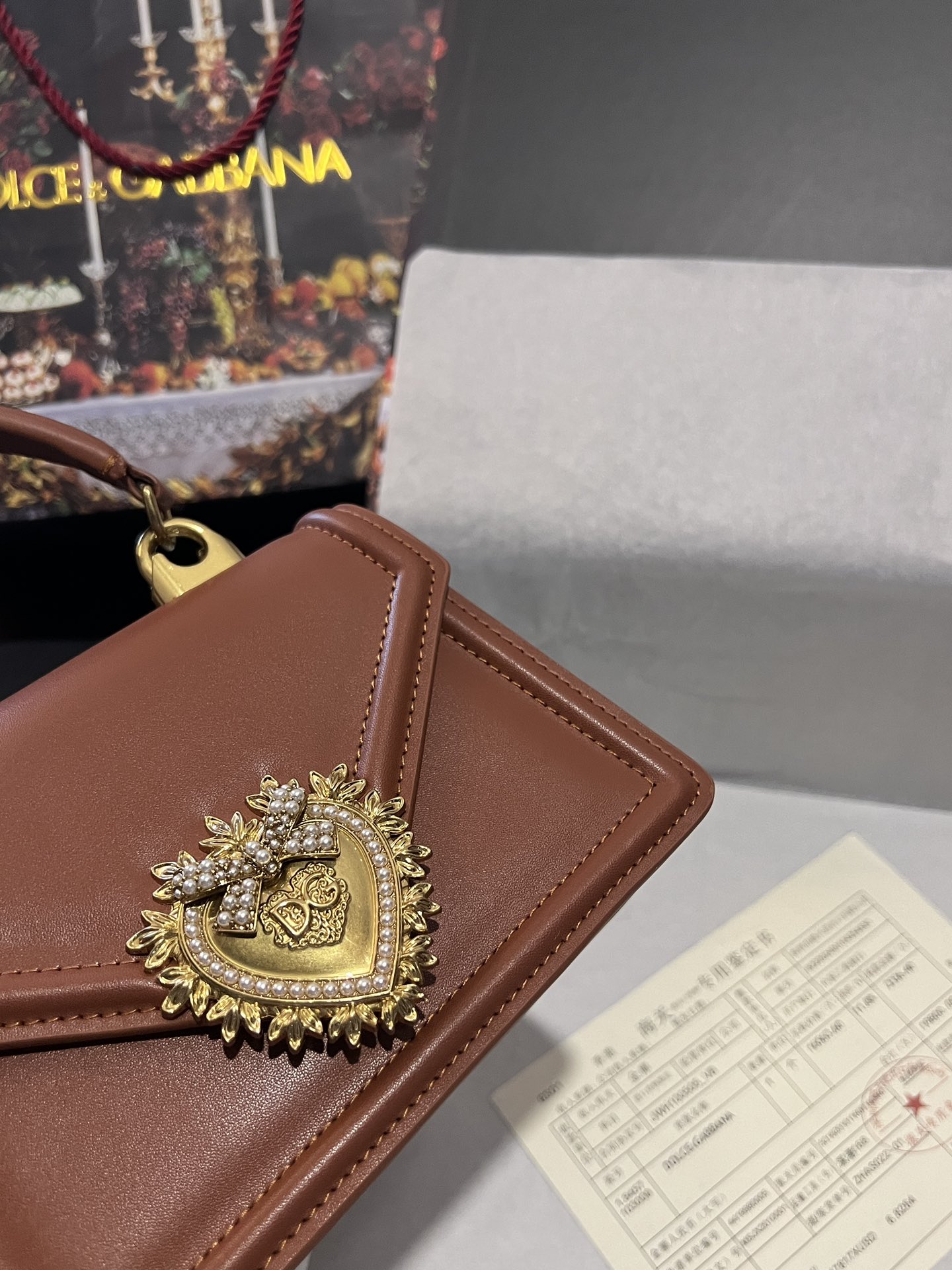 Dolce & Gabbana Small Devotion top-handle bag in Beige for Women