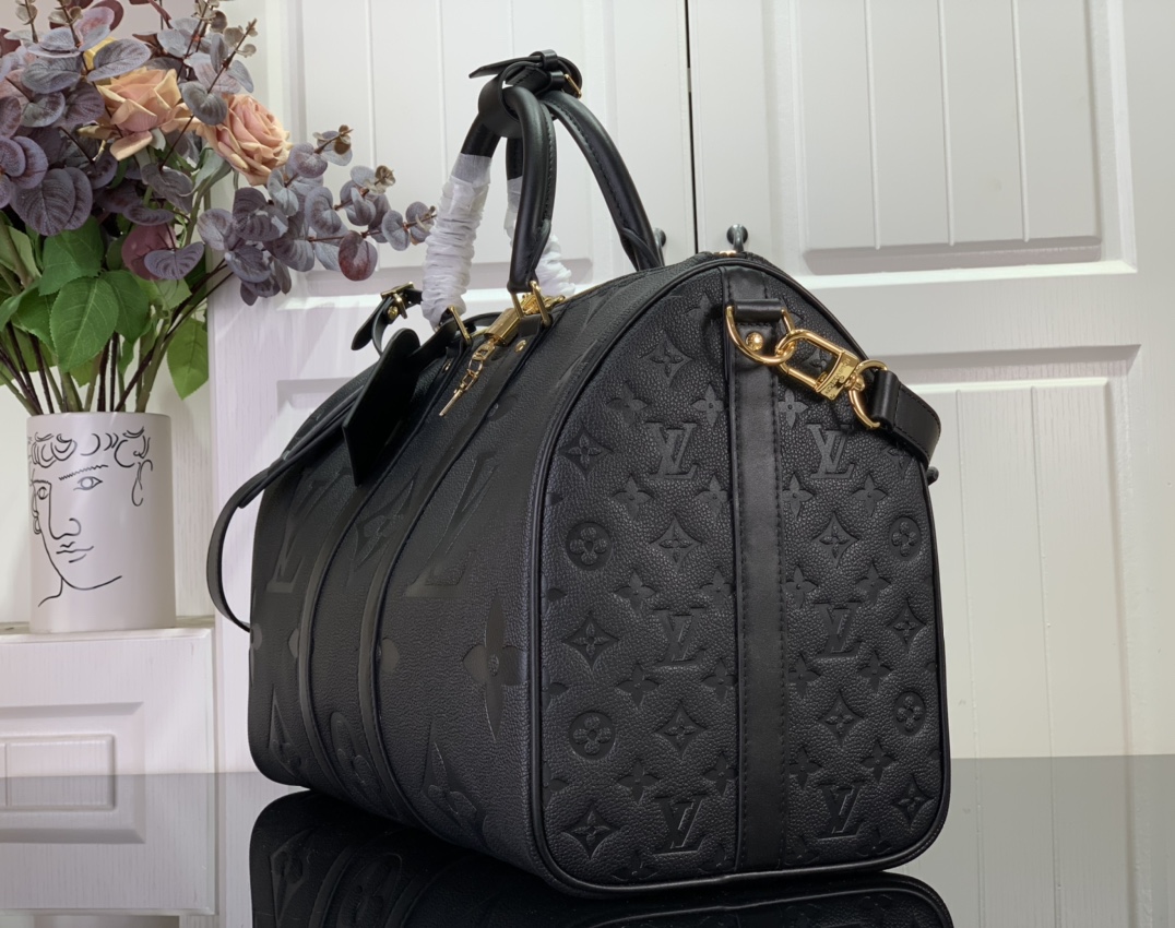 Fashionphile LOUIS VUITTON Empreinte Monogram Giant Keepall