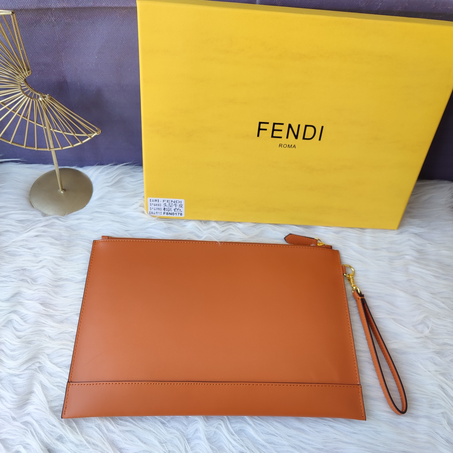 Fendi Debossed-logo Wrist Strap Pouch In Brown