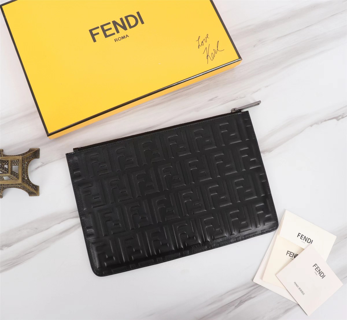 Fendi men's clutch, made of black leather.