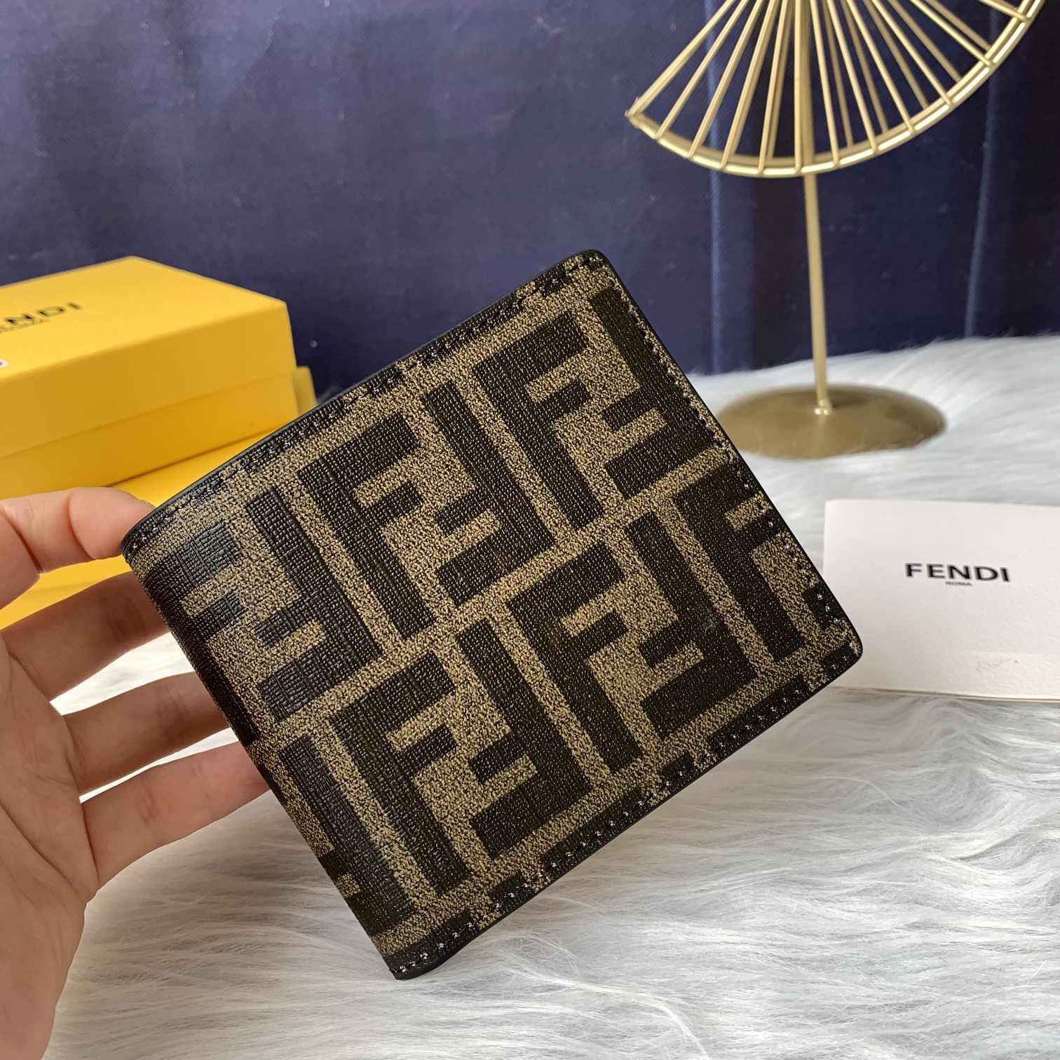 Fendi short men's wallet, specifically the Fendi short men's Rep 1:1 model, black, rough leather, yellow eyes FD 05