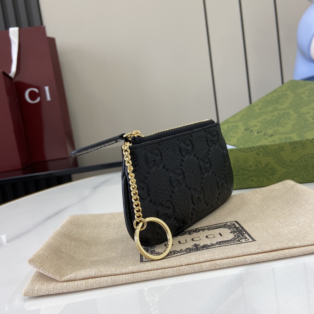 GG Emblem key pouch in black leather | GUCCI