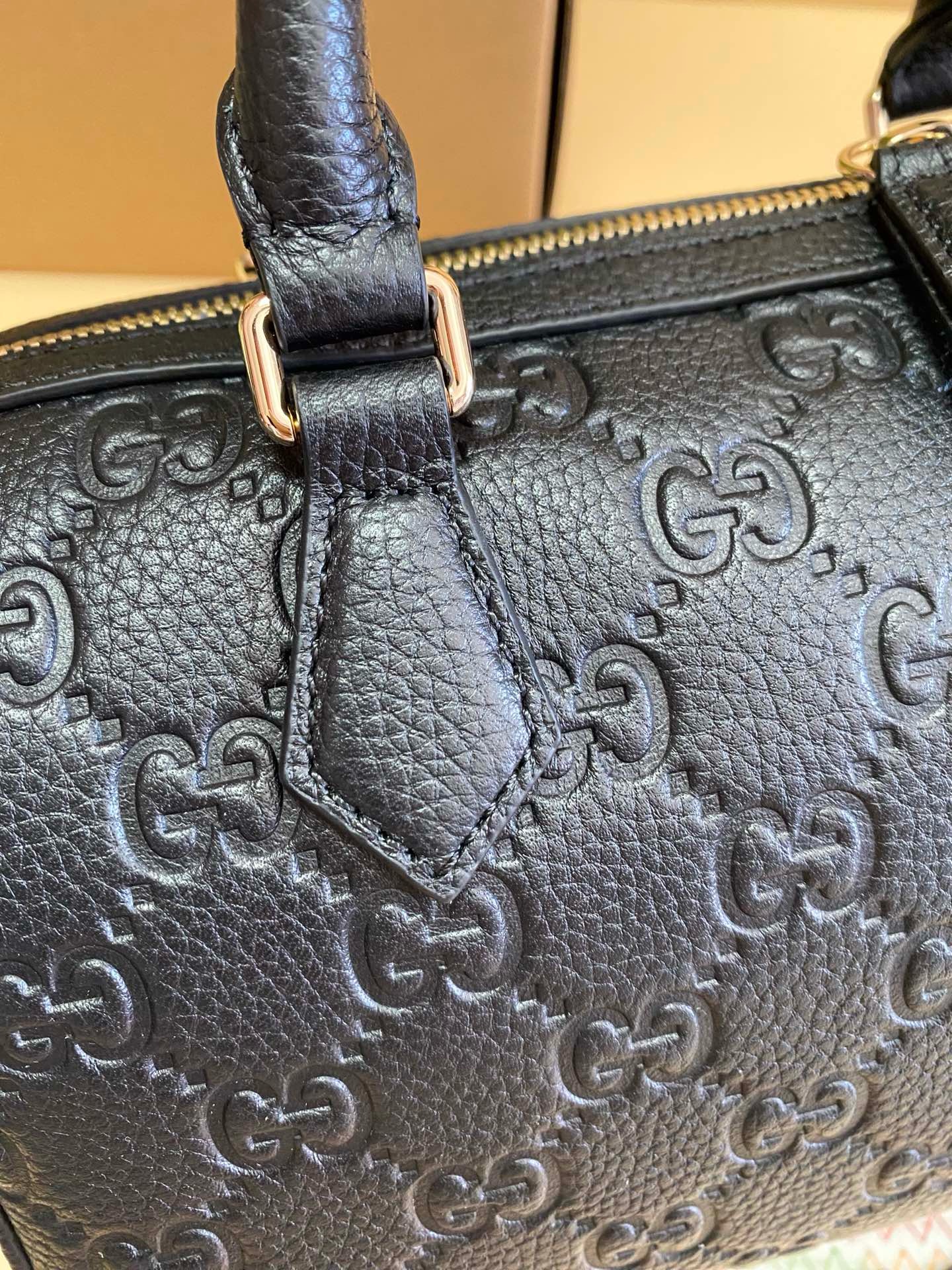 GG Emblem medium boston bag in black GG leather