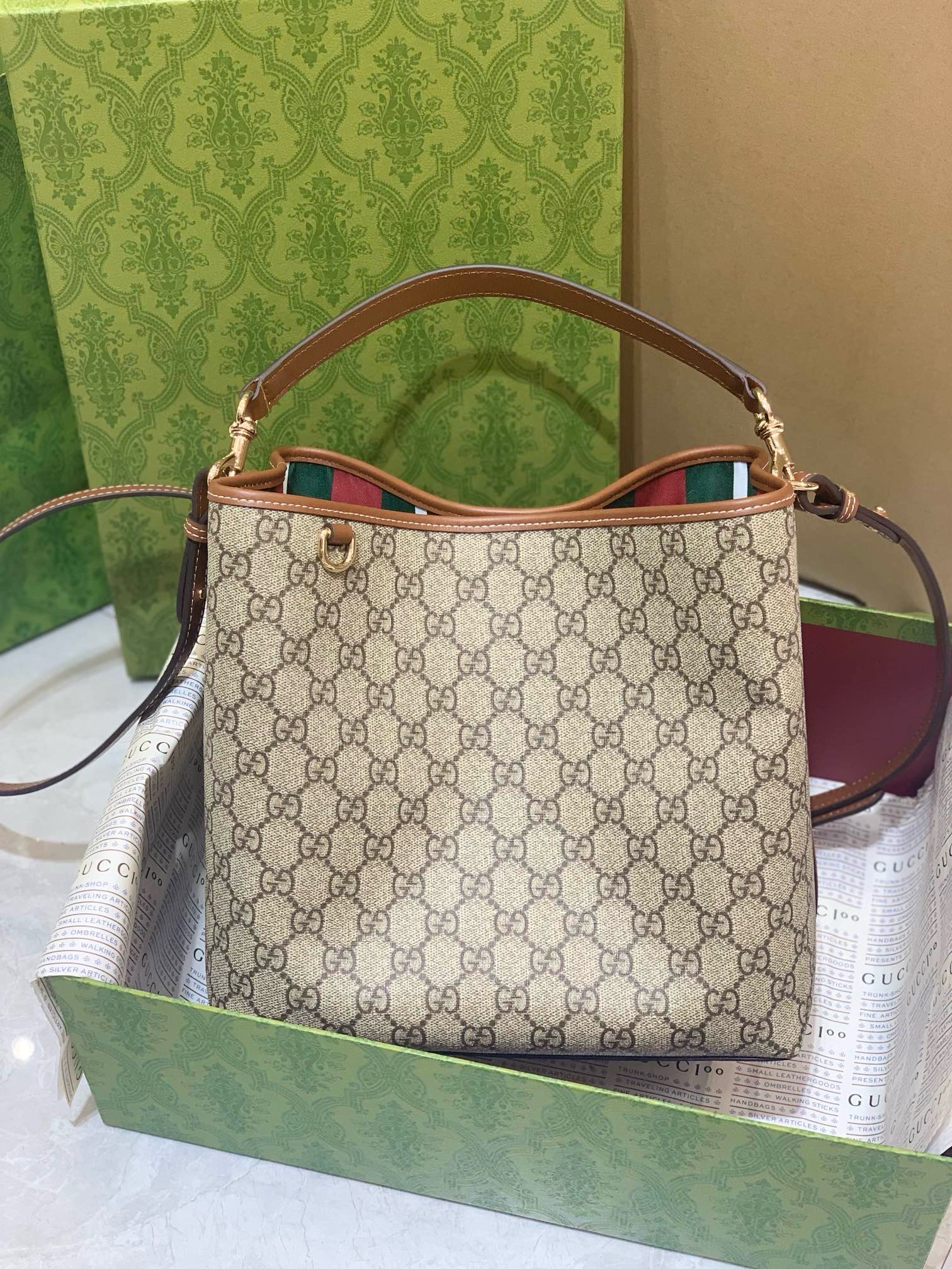 GG Emblem medium bucket bag in Beige GG Canvas