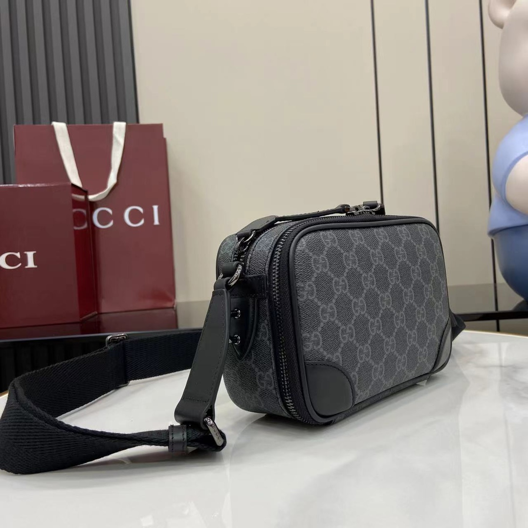 GG Emblem mini crossbody bag in Black GG Canvas | GUCCI