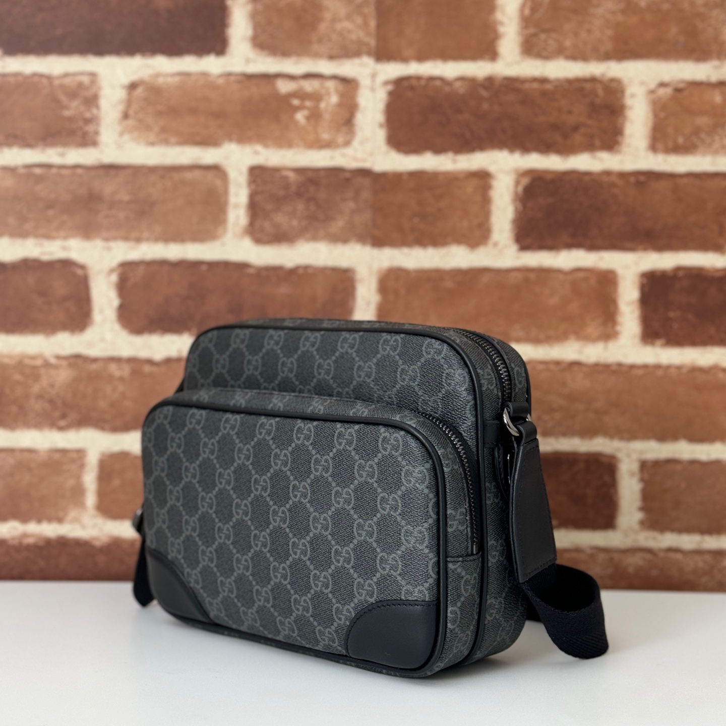 GG Emblem small crossbody bag in black fabric | GUCCI