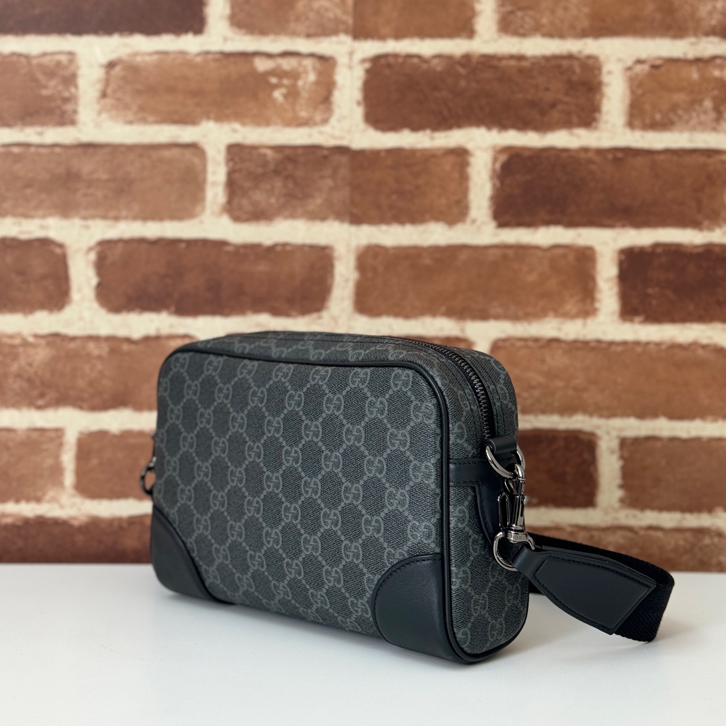 GG Emblem small crossbody bag in black fabric | GUCCI