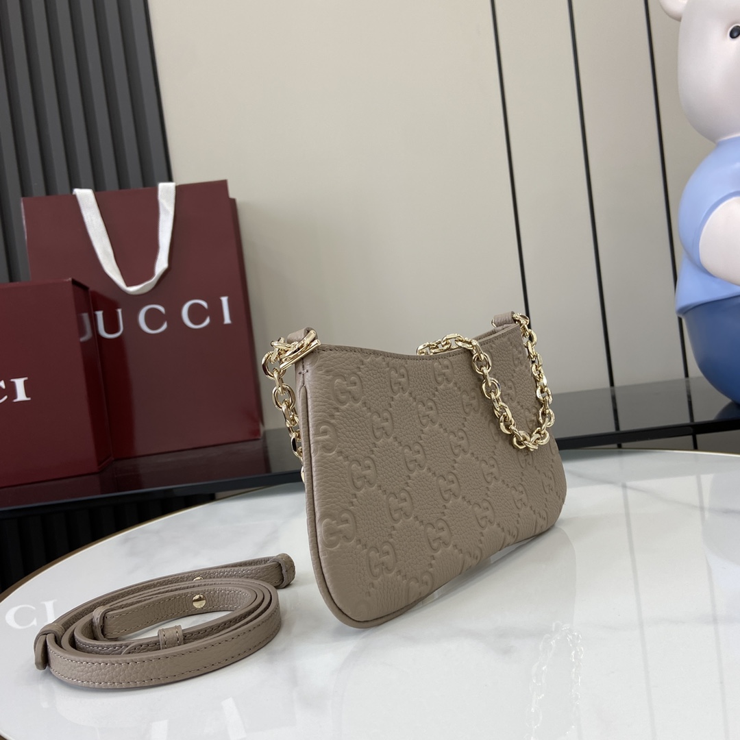 GG Emblem small shoulder bag in Neutral Leather | GUCCI