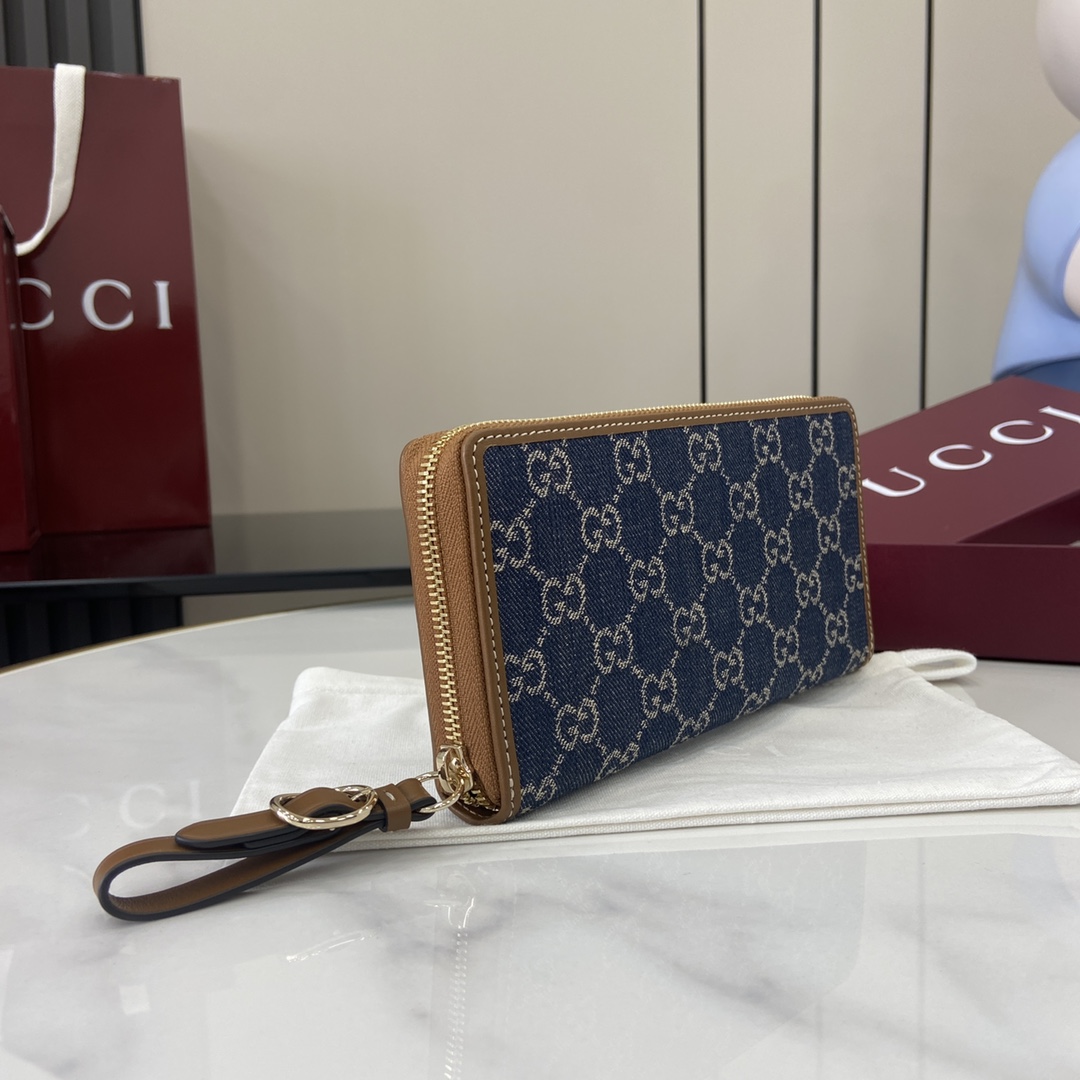 GG Emblem zip around wallet in blue and ivory denim | GUCCI