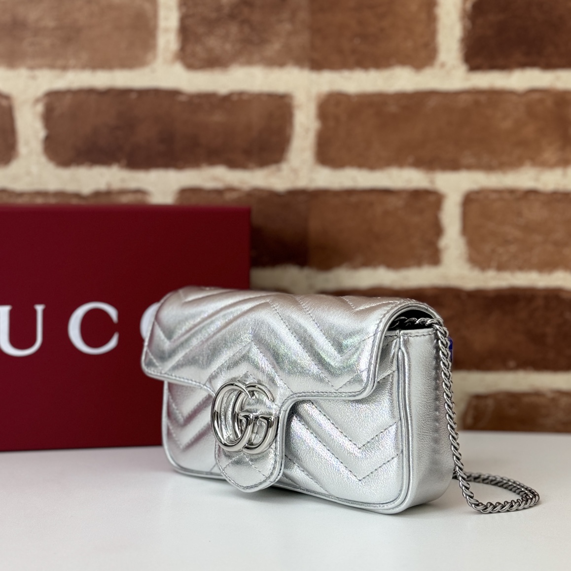 GG Marmont mini bag in Silver Leather | GUCCI