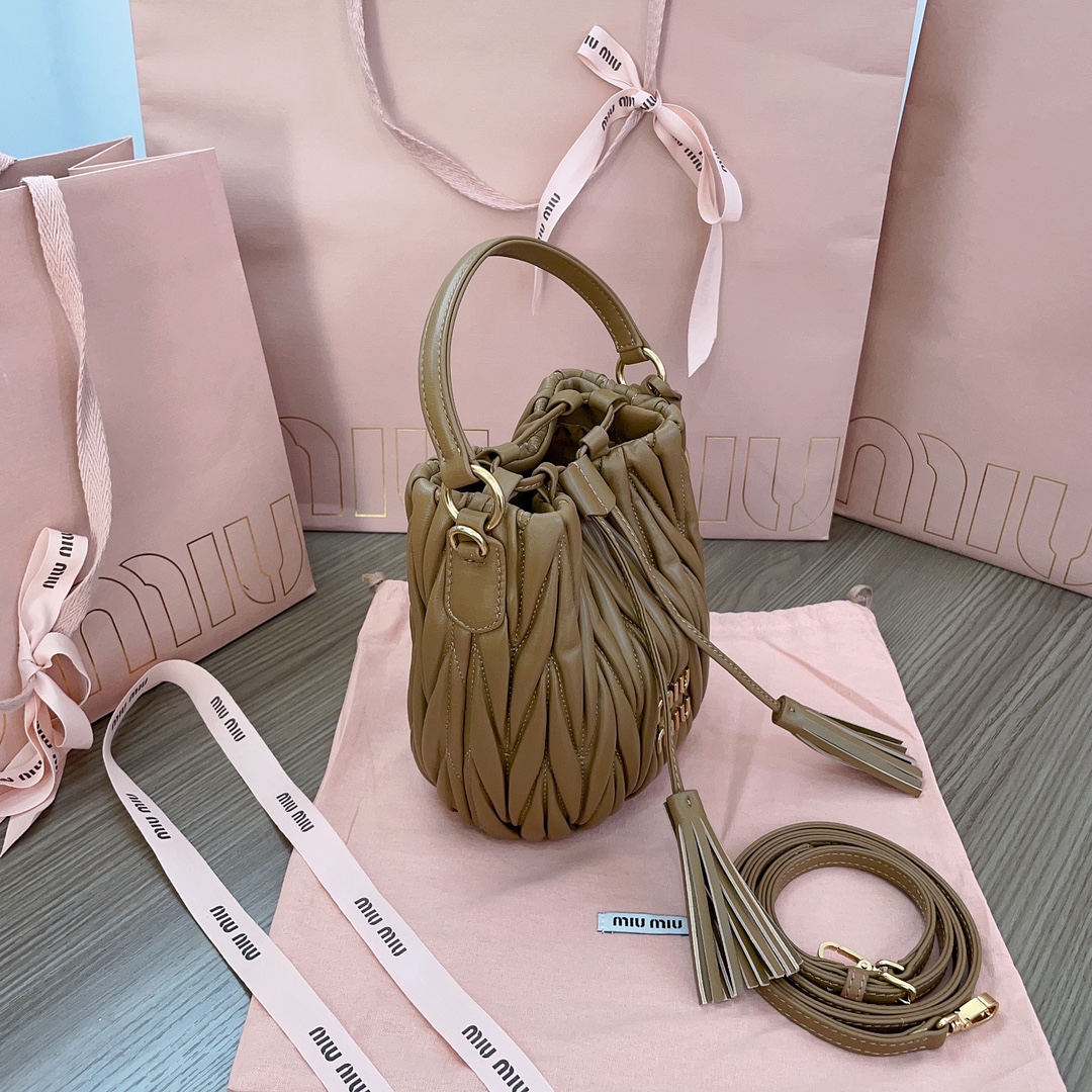 green Miu Miu Bucket bags and bucket purses for Women