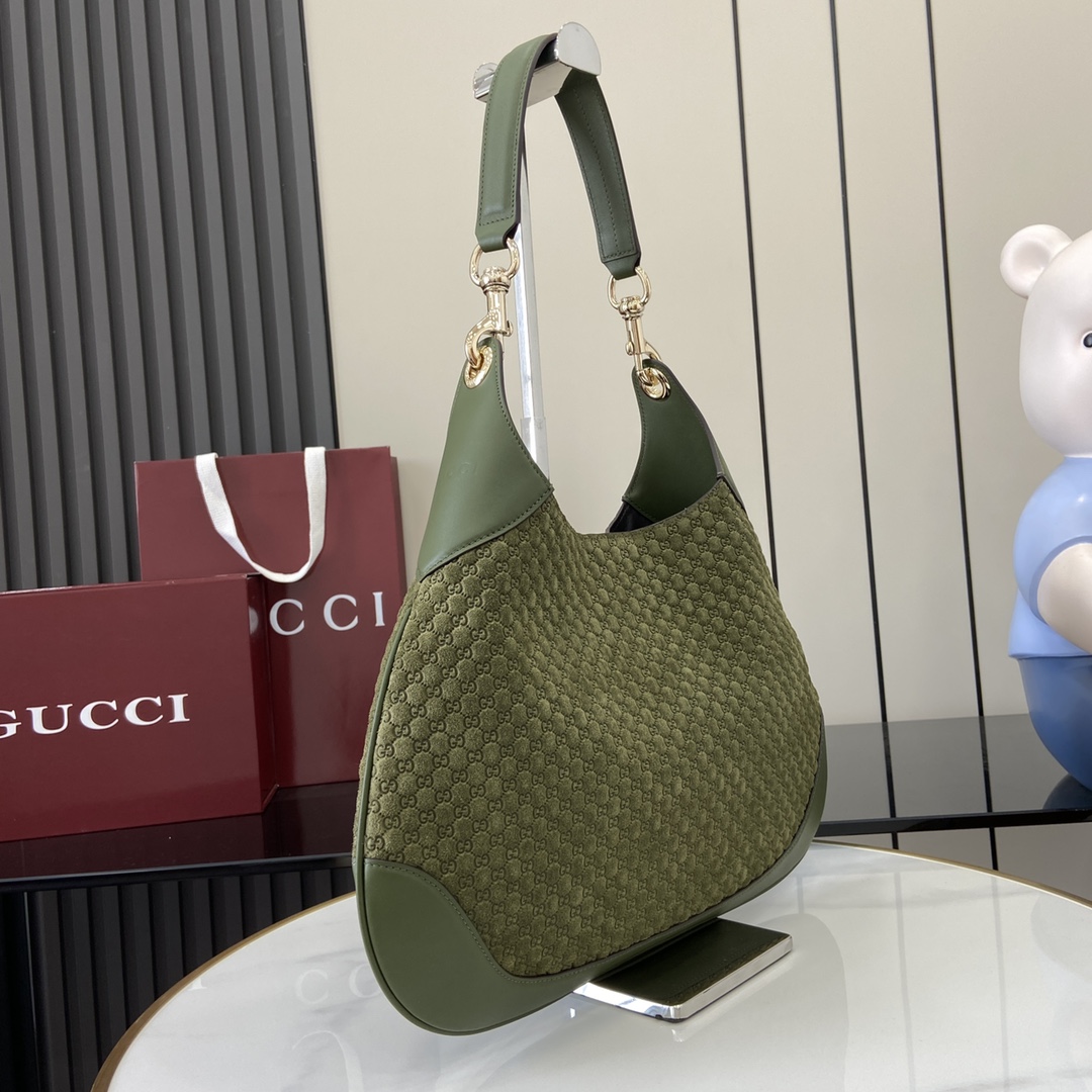 Gucci B medium shoulder bag in dark green GG suede