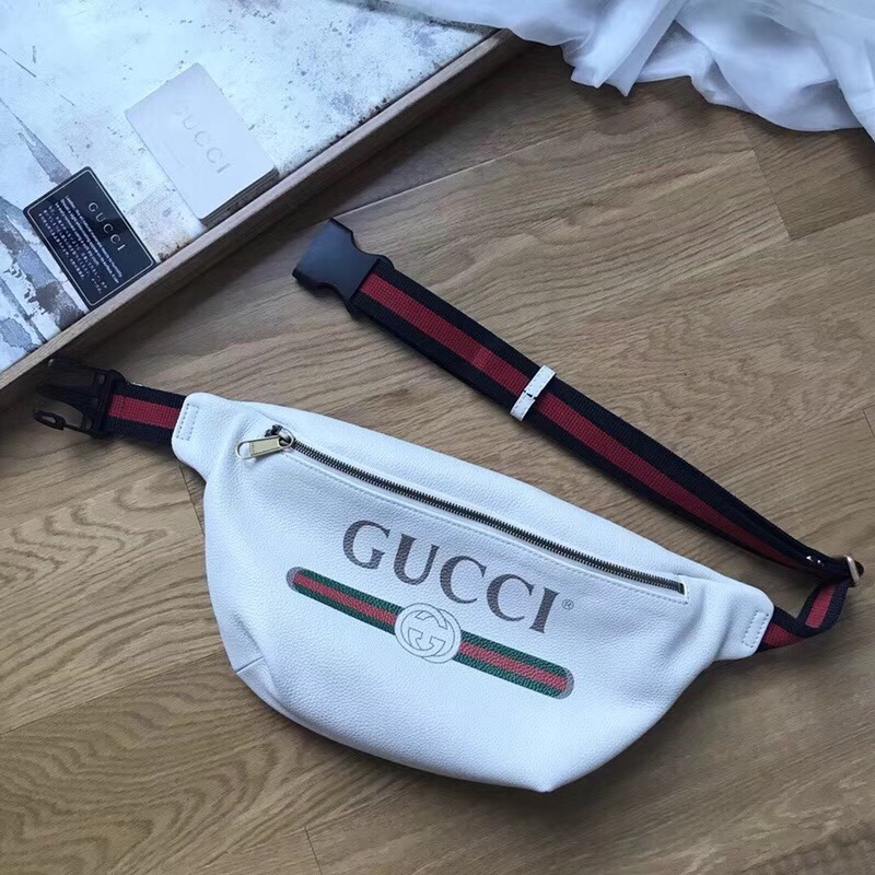 Gucci White Web Stripe Belt Bag with large logo and adjustable strap on wooden floor