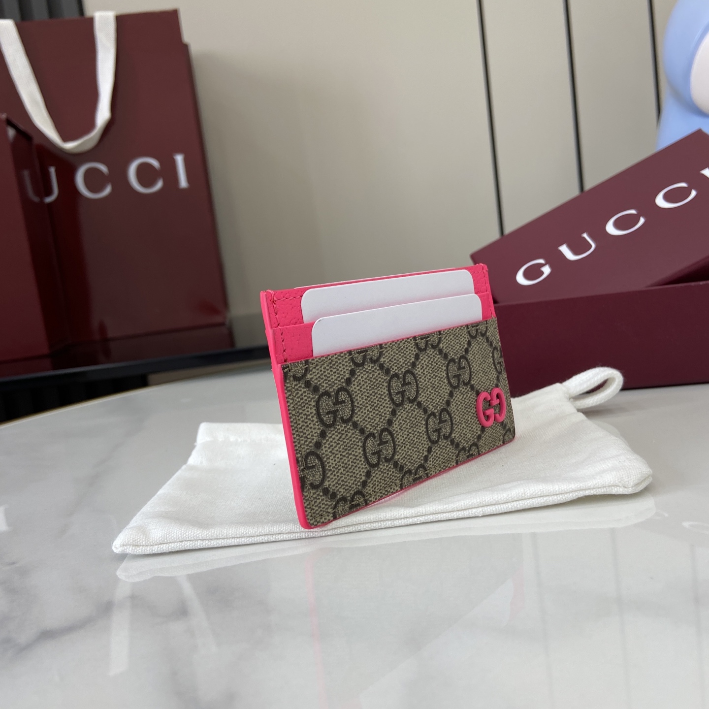 Gucci Bi-color GG long card case in black GG Supreme canvas