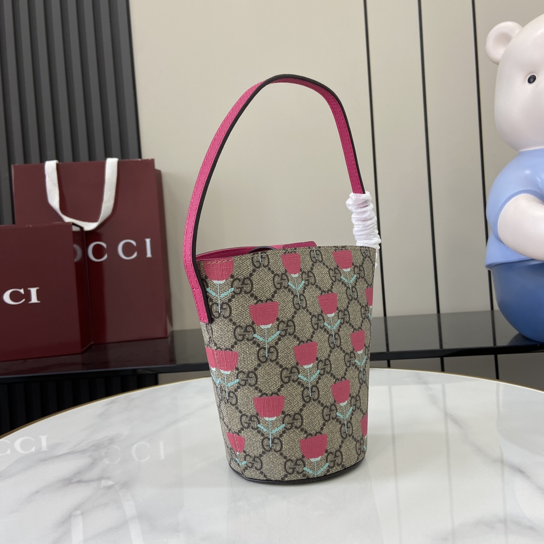 Gucci  Children's printed GG bucket bag in beige and ebony GG