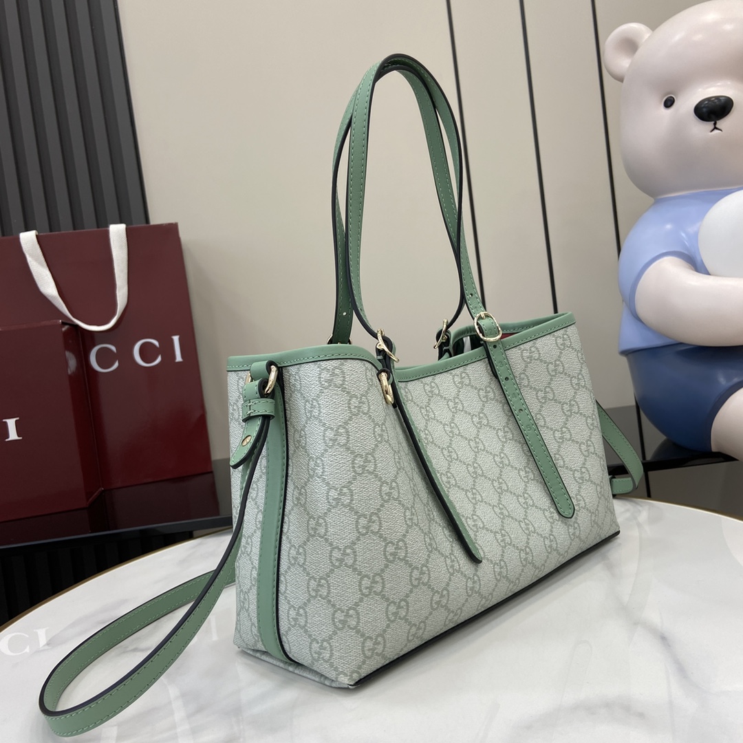 Gucci  Emblem medium tote bag in Green GG Canvas | GUCCI® SI