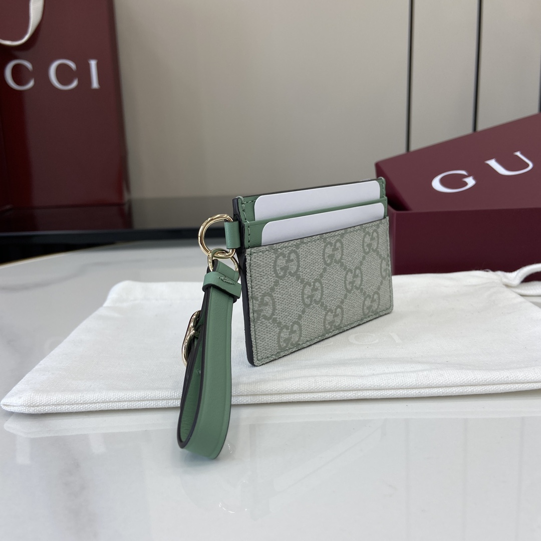 Gucci GG Emblem card case with strap in sage white - Gucci