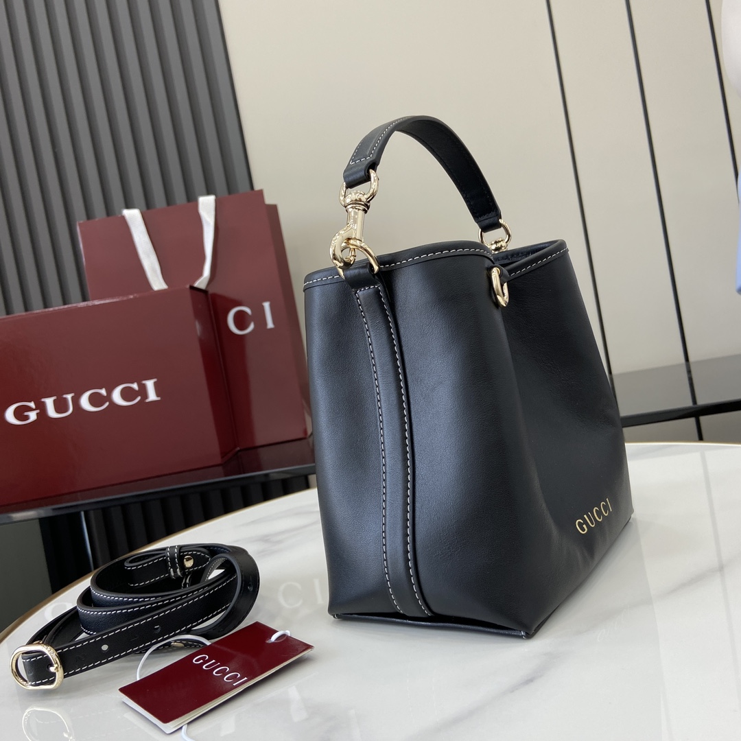 Gucci GG Emblem small bucket bag in black leather | GUCCI