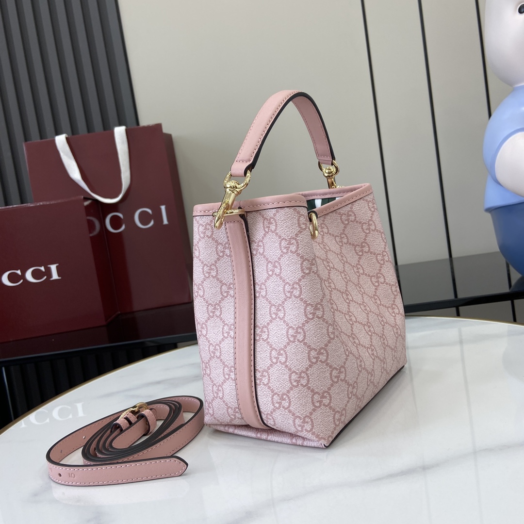 Gucci GG Emblem small bucket bag in light pink coated fabric