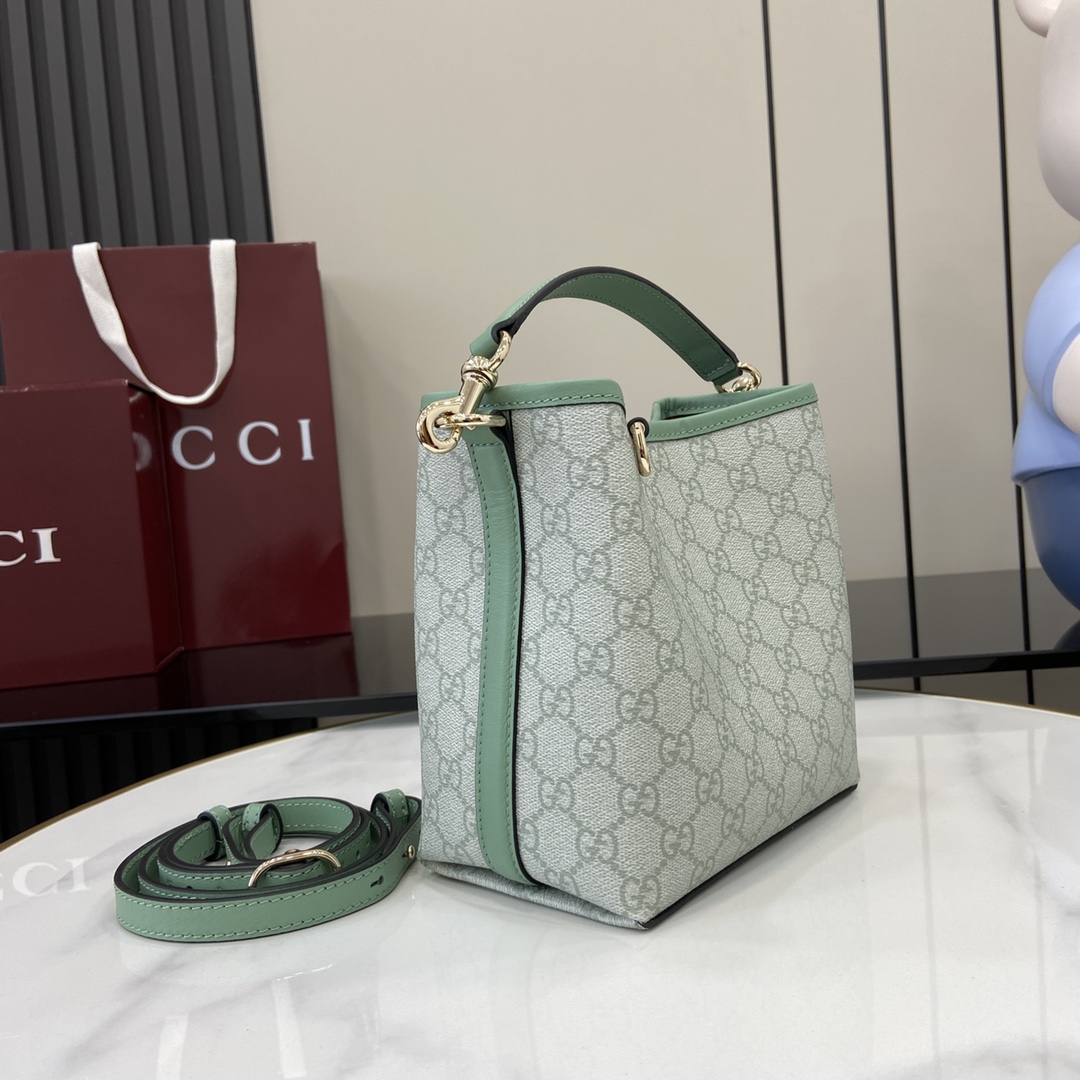 Gucci GG Emblem small bucket bag in sage green fabric | GUCCI
