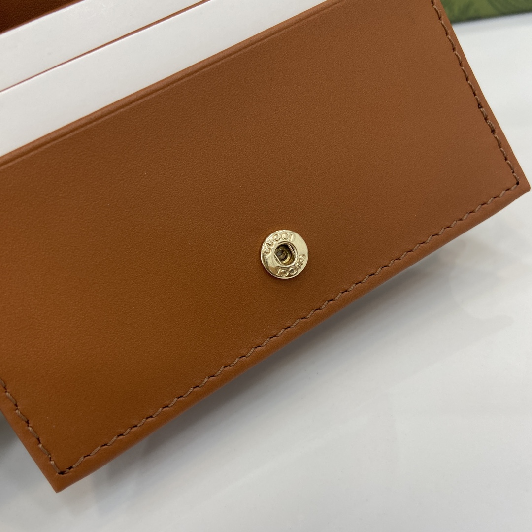 Gucci GG Emblem small wallet in beige and dark brown fabric