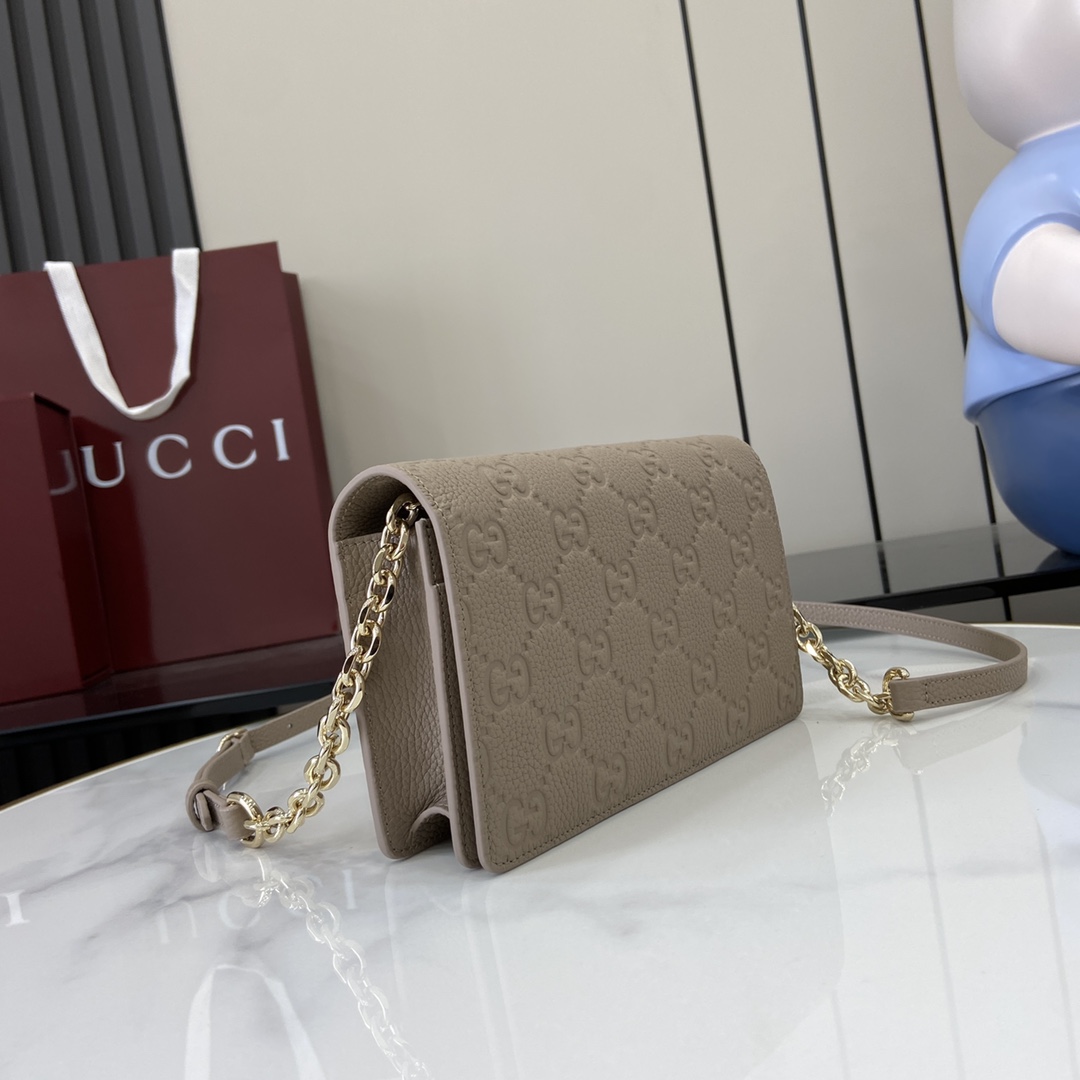 Gucci GG Emblem wallet on chain in taupe leather | GUCCI
