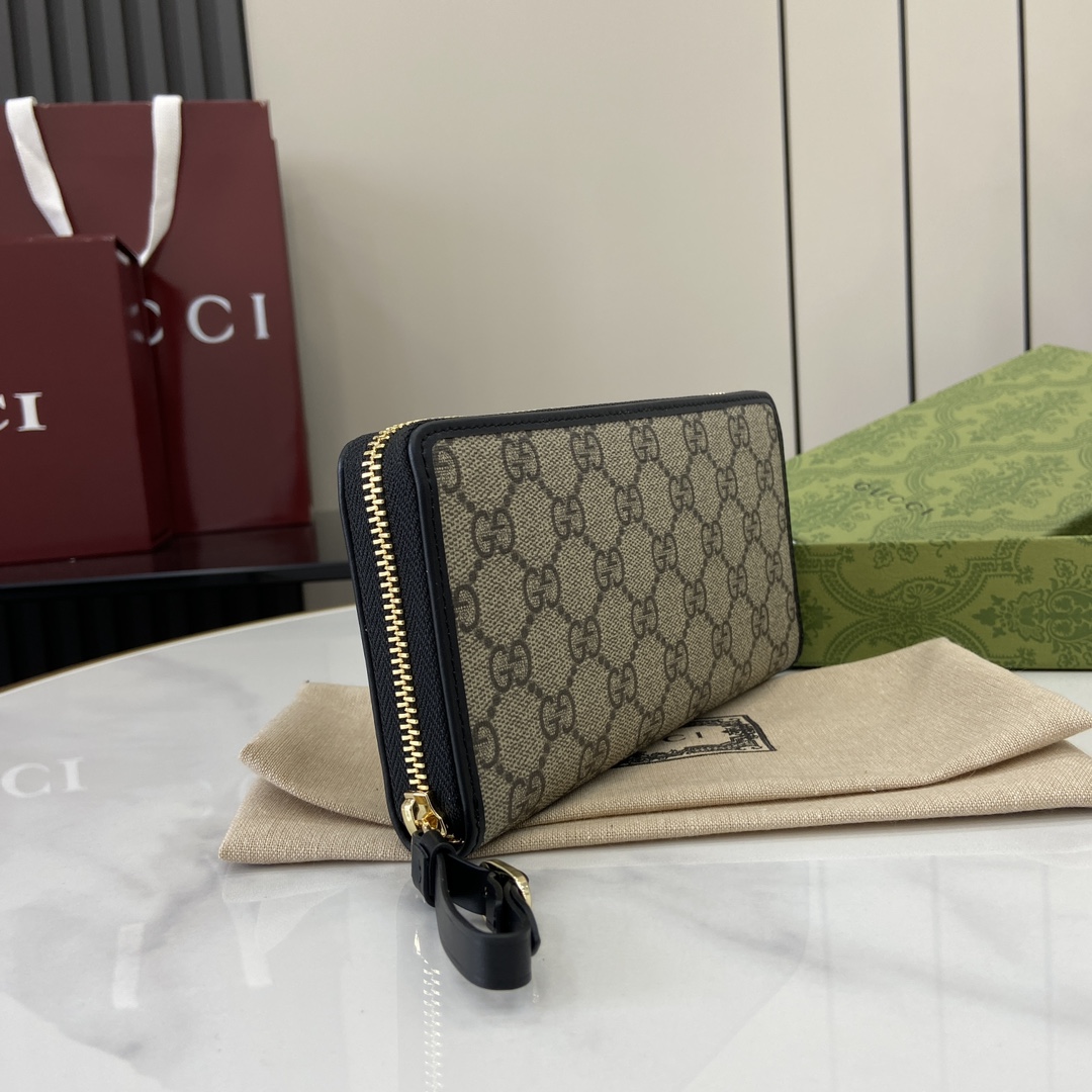 Gucci GG Emblem zip around wallet in Blue Fabric | GUCCI