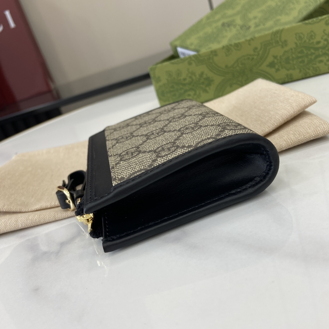 Gucci GG Emblem zip card case in beige and dark brown fabric