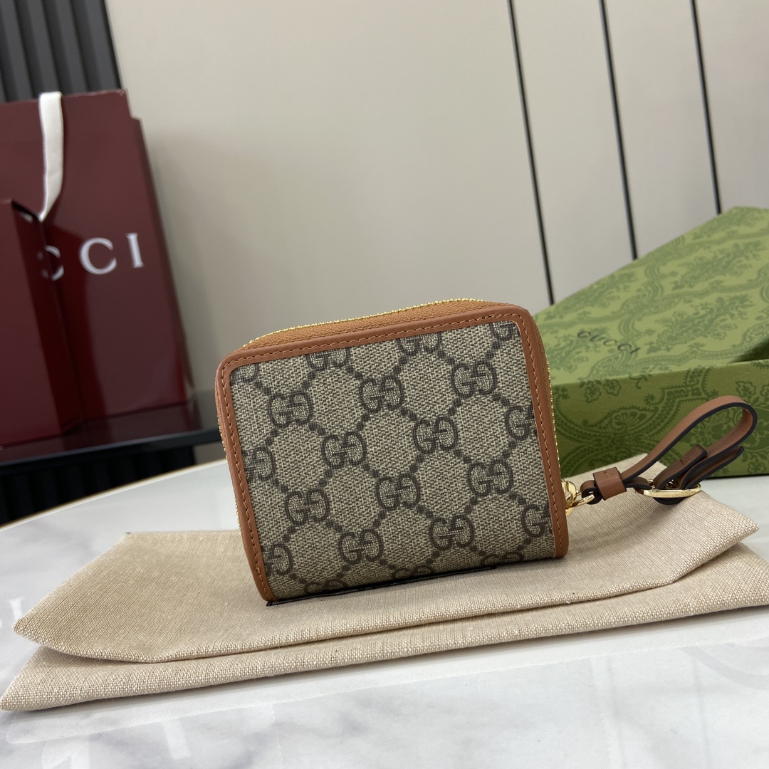 Gucci GG Emblem zip mini wallet in beige and dark brown fabric
