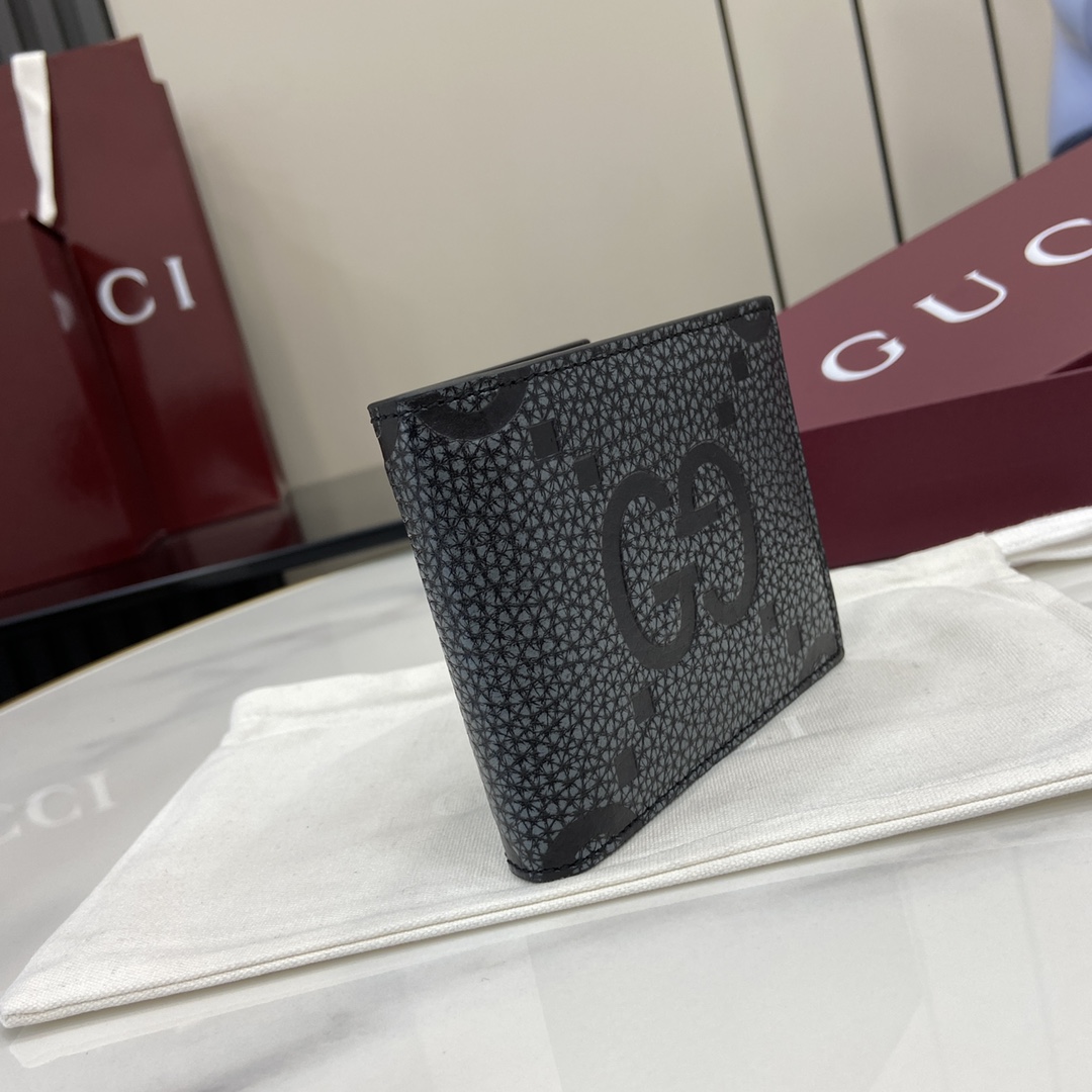 Gucci GG Jumbo bi-fold wallet in dark grey and black leather