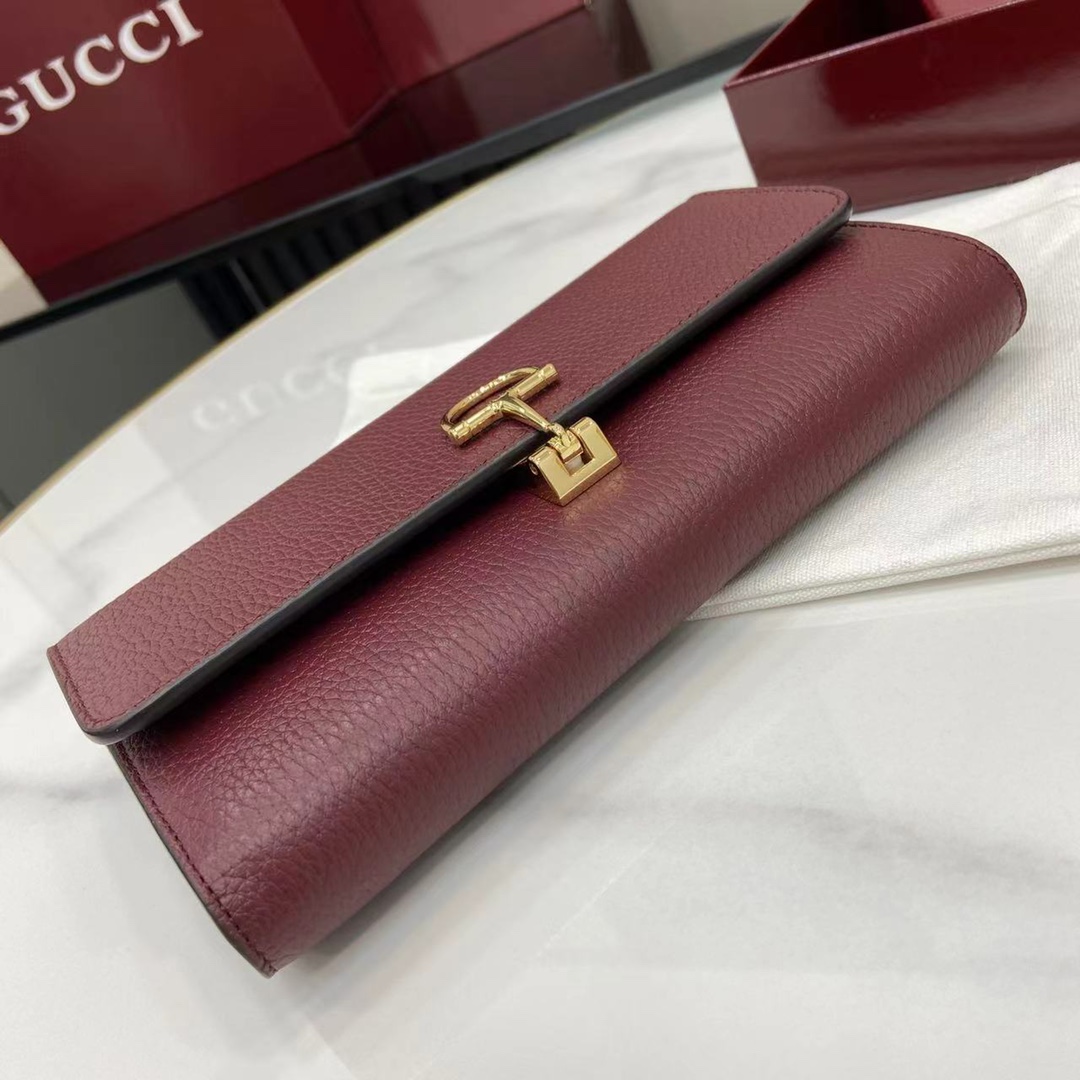 Gucci GG Marmont bi-color wallet on chain in Beige Black GG Canvas Leather