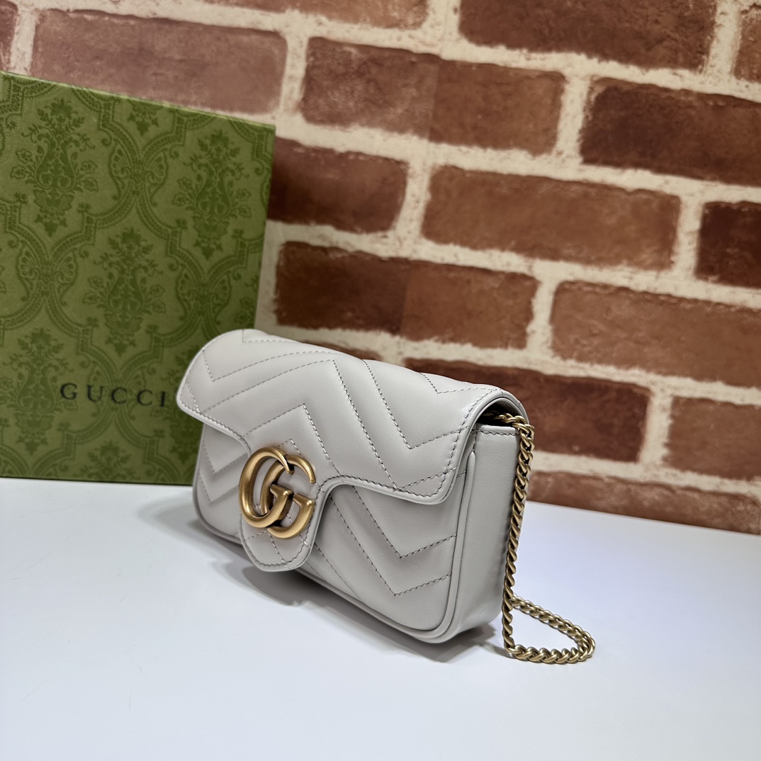 GUCCI GG Marmont key case in Gold Leather | GUCCI® SI